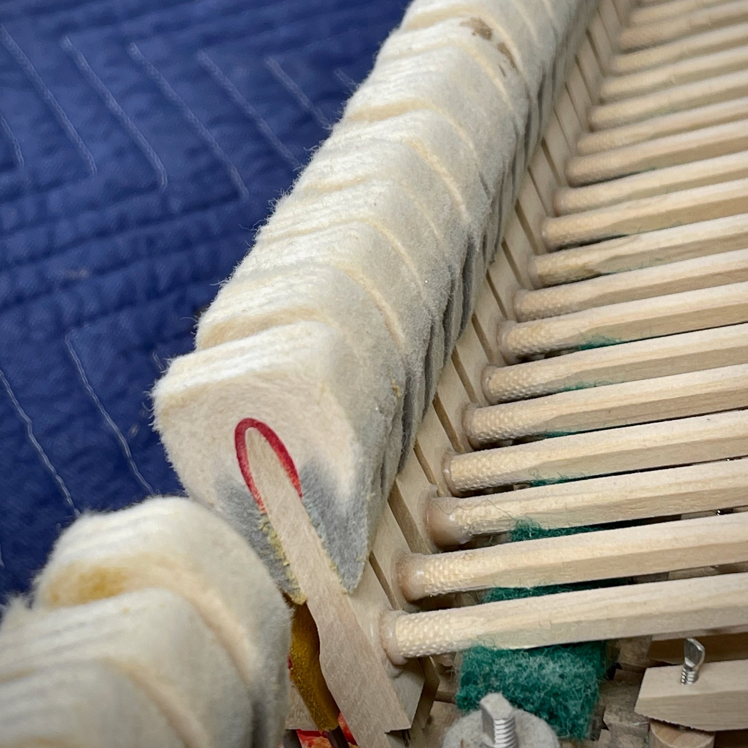 These hammers are less than 40 years old, but the piano was very well loved to say the least.