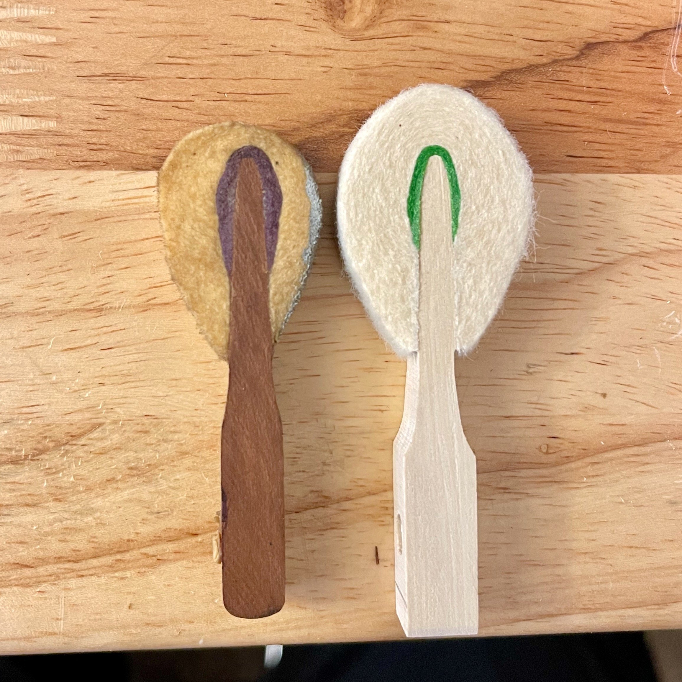 A comparison of old and new. Notice the uneven hammer filing the old hammer on the left has undergone.
