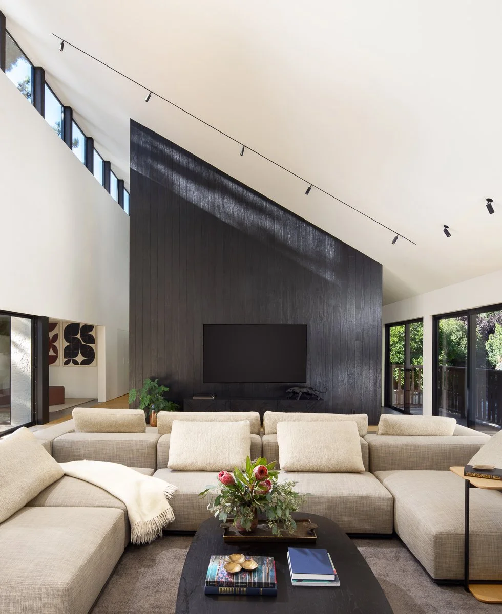 feature wall of Shou Sugi Ban high ceiling with custom lighting design by Murray Agnew in Silicon Valley modern home