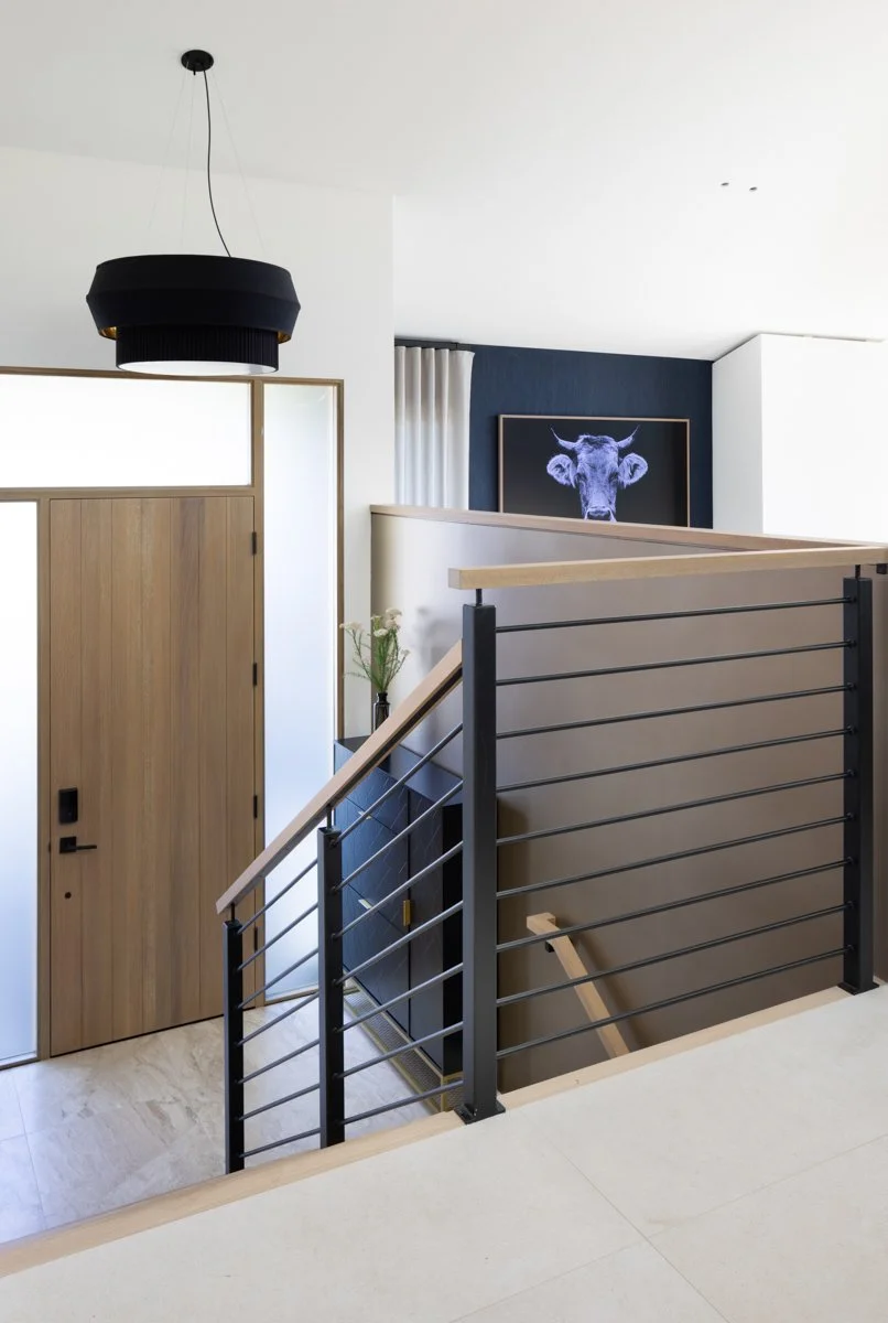 Stair way entrance to modern remodel by gamble + design