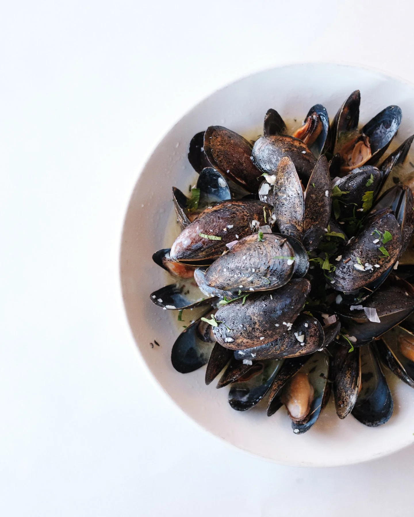 Moules Frites, done the Red Hat way 🍷✨
Steamed with garlic, white wine, butter, thyme, and shallots&mdash;served with a generous side of crispy frites for dipping and savoring. Cozy, classic, and perfect by the river.

Join us for dinner and treat y