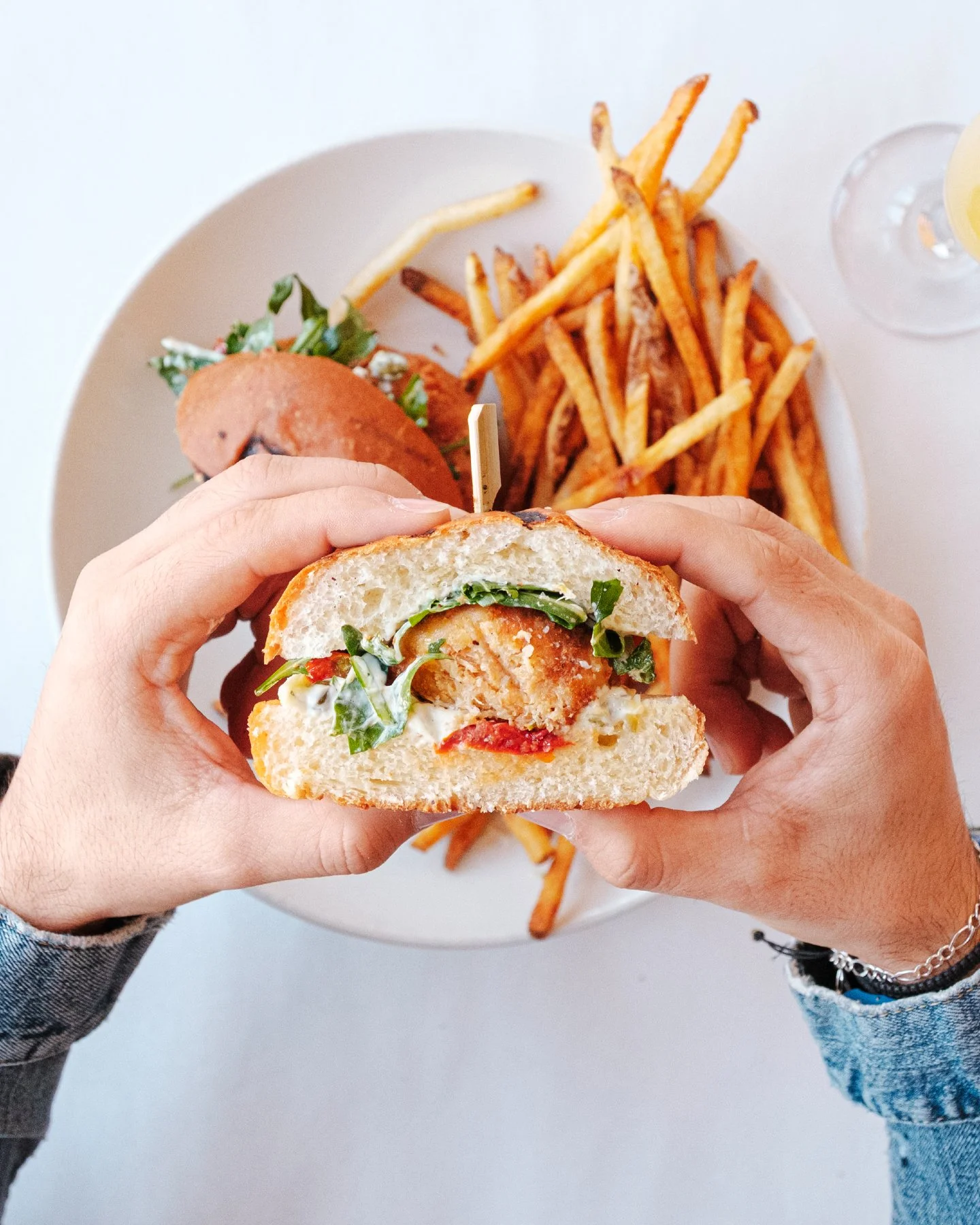 Golden, crispy, and stacked just right. 🦀✨

Our Crab Cake Sandwich is layered with lemon tartar sauce, roasted tomato, fresh greens, all tucked into a buttery brioche roll &mdash; served with your choice of greens or breakfast potatoes.

It&rsquo;s 
