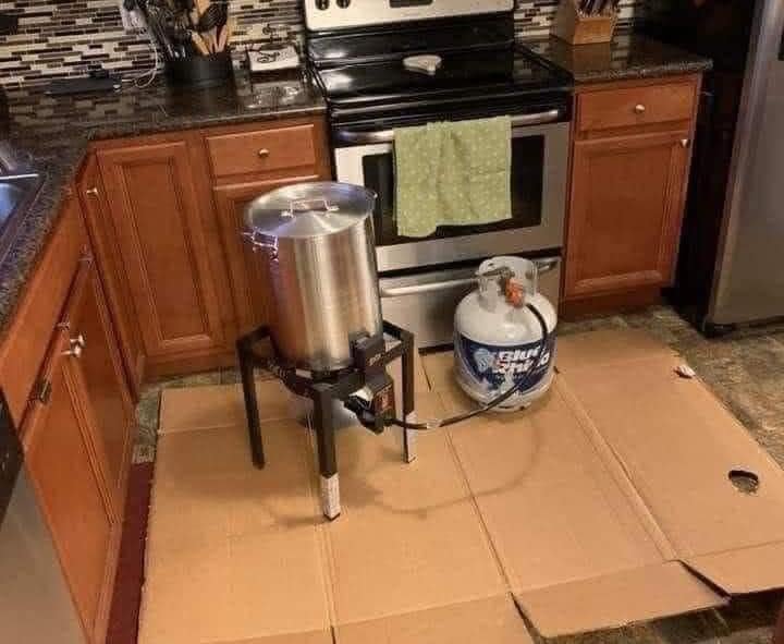 Starting the turkey before I leave for work.

Since I&rsquo;ll be gone all day, I made sure the propane bottle was full, but I have two more on standby, just out of the photo.