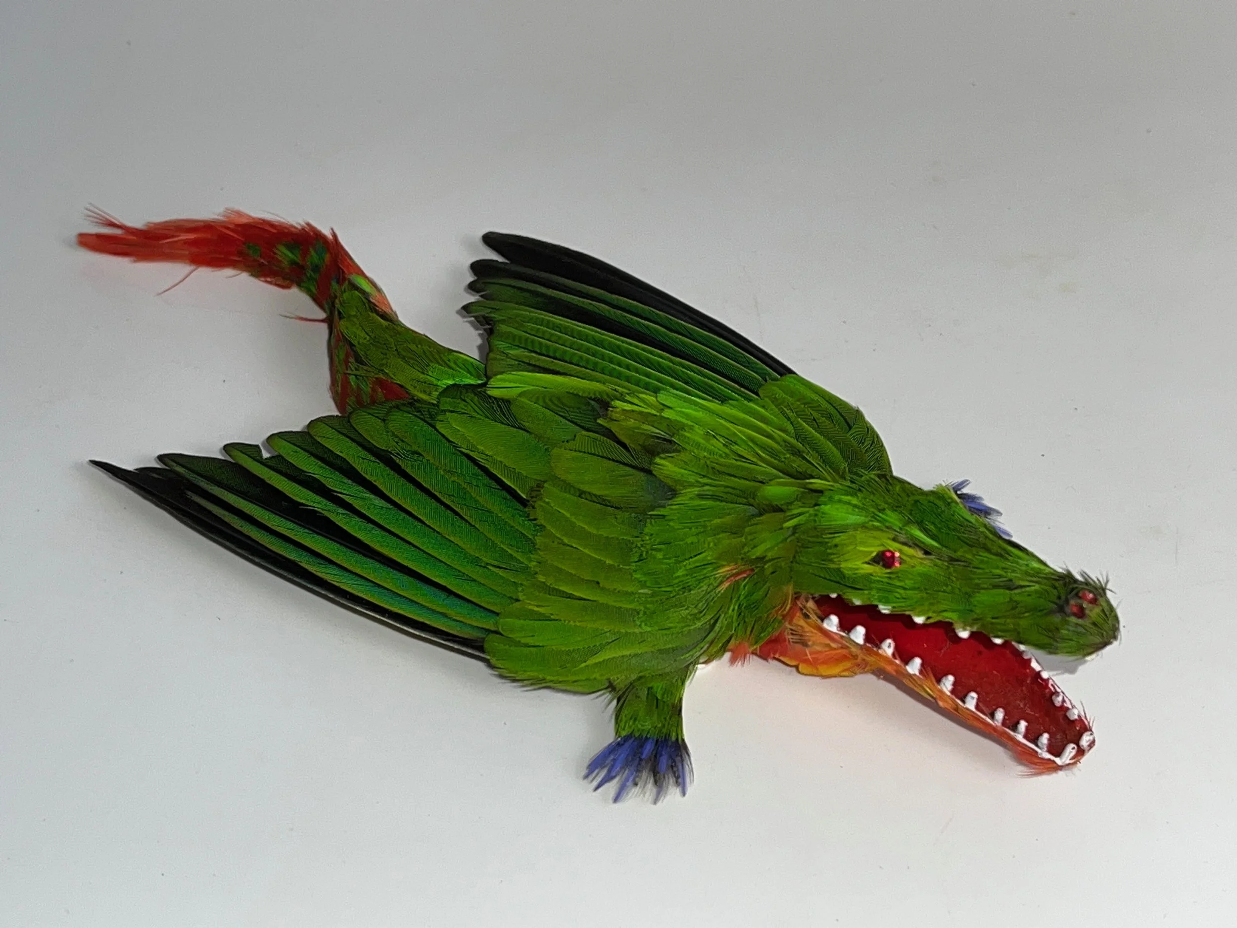 Crocokeet 2024 Lorikeet feathers and mixed media 4x15x10cm RRP $390