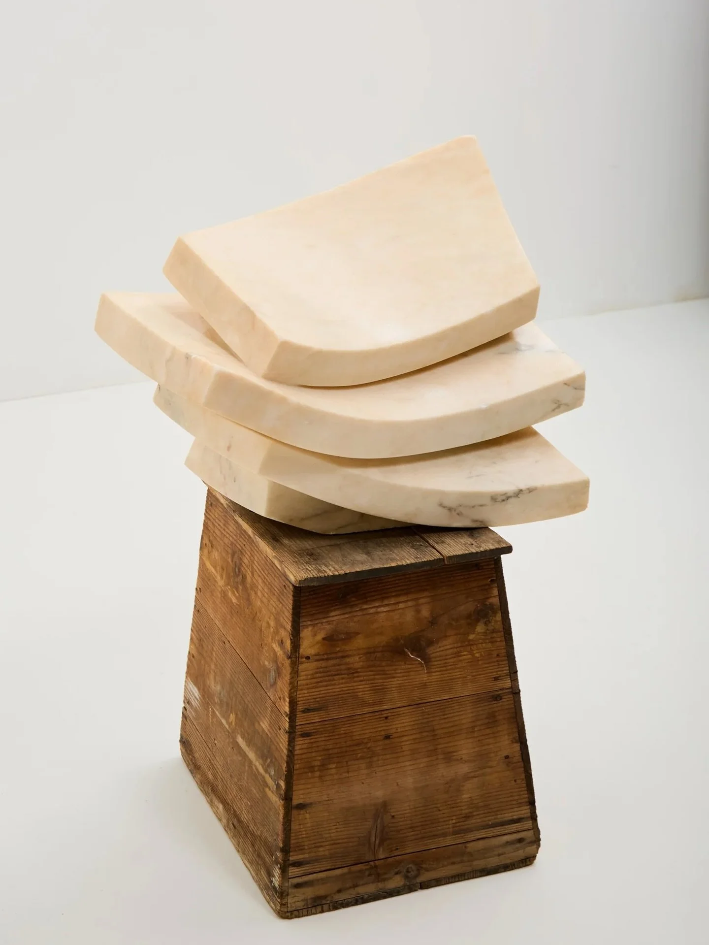 Dusky pink delight.. 

A large scale abstract sculpture in solid peachy marble. Thickly carved leaves give the impression of fluidity and levity..

Monogrammed and dated &lsquo;78

H 60cm x W 45cm x D 30cm