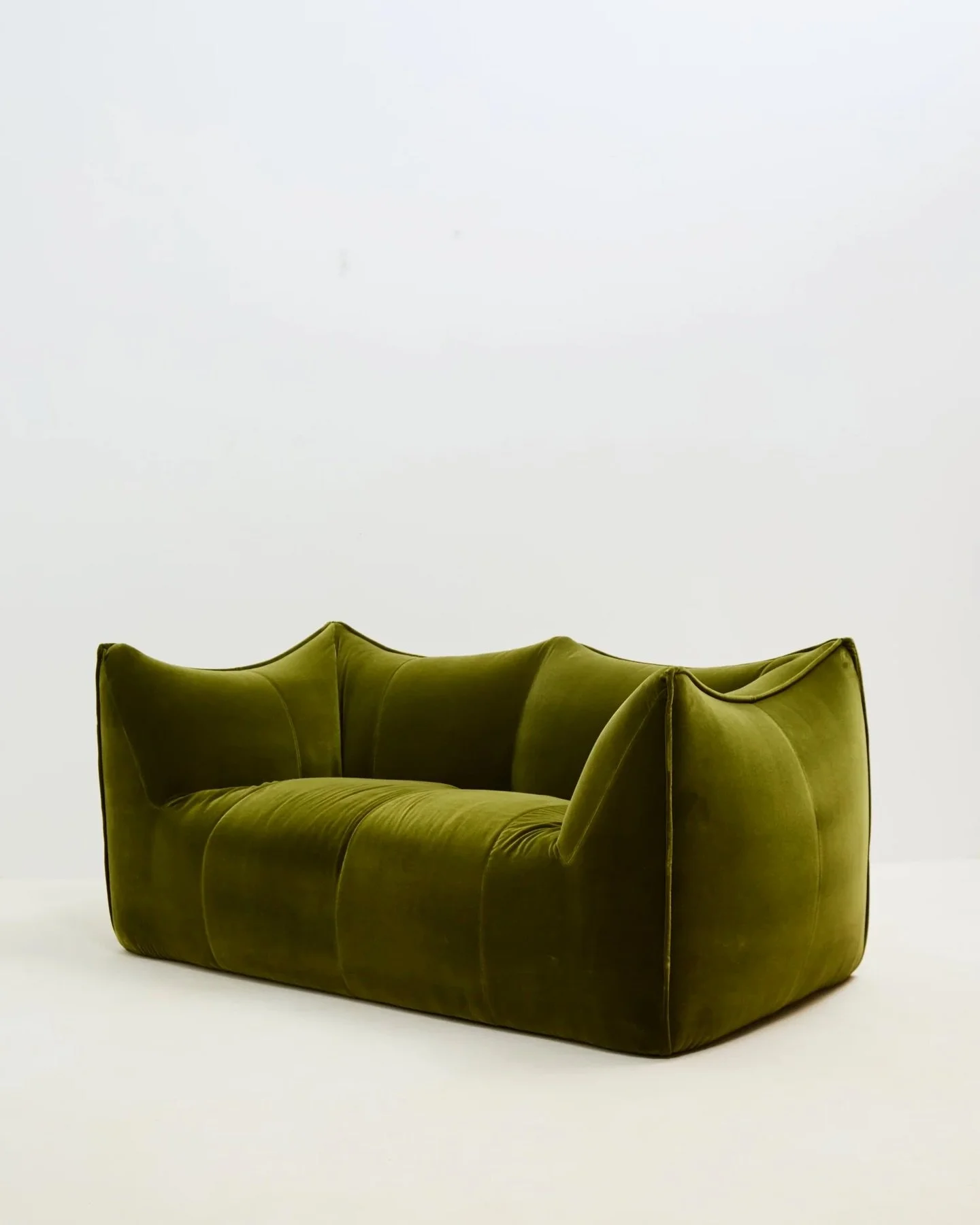 &ldquo;Le Bambole&rdquo;, said Bellini, &ldquo;are not covered in fabric. Instead, they are built of fabric.&rdquo; 

This two seater version is an original 1970s issue, recently reupholstered in Pierre Frey velvet by the ultra talented @altyn_uphols