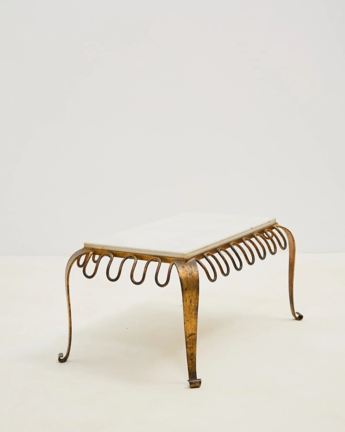 1940s Spanish gilt / marble coffee table.. with a distinct nod to a design great of the same period, Jean Roy&egrave;re.