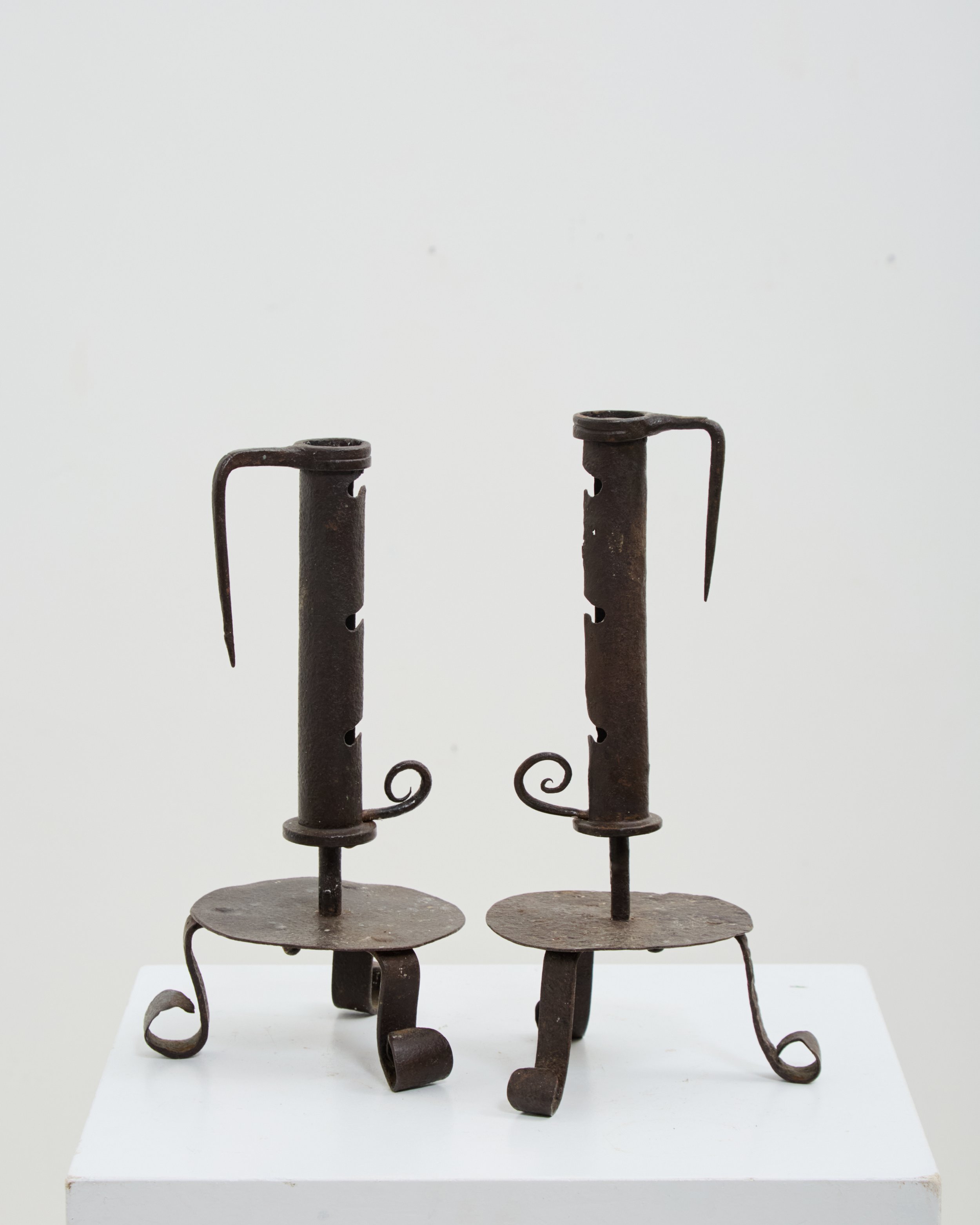 EARLY IRON CANDLESTICKS