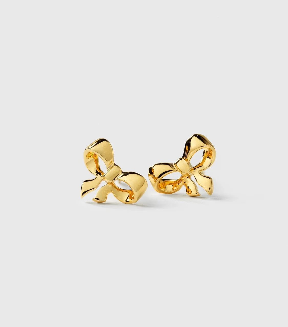 Syster P Ohrstecker Rosie mini Schleife Gold 3.jpeg