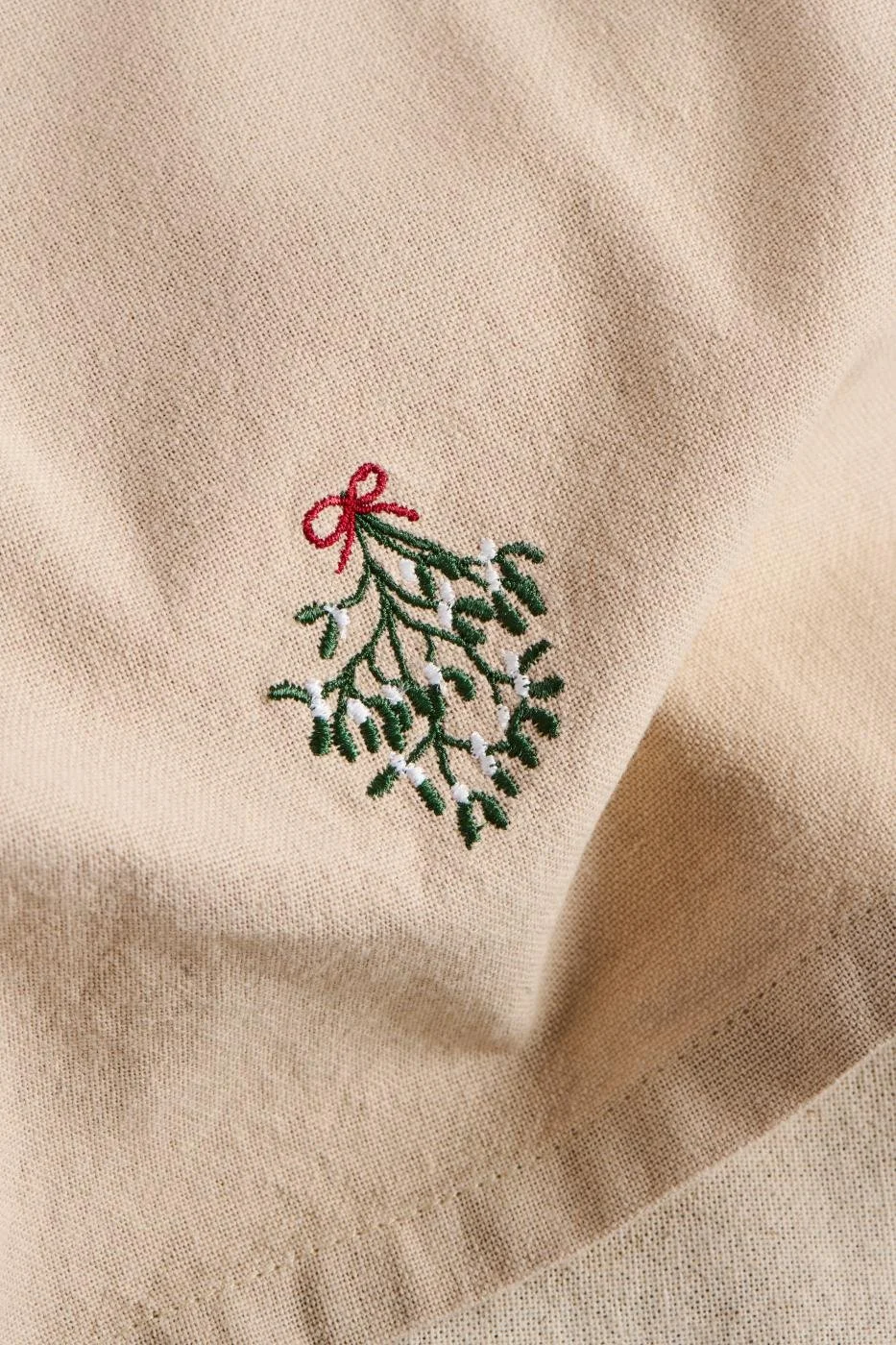 Ib Laursen Stoff Serviette Farbe Leinen mit gruenem Mistelzweig.jpg