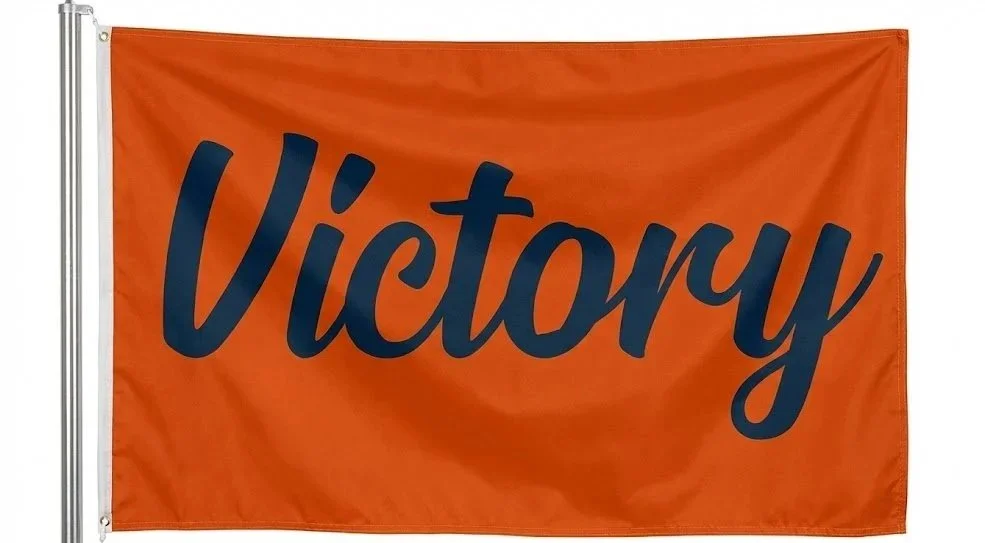 High-contrast Orange Bears Victory Flag with bold. Bears Flag navy lettering and [stylized helmet / V-script] logo details.