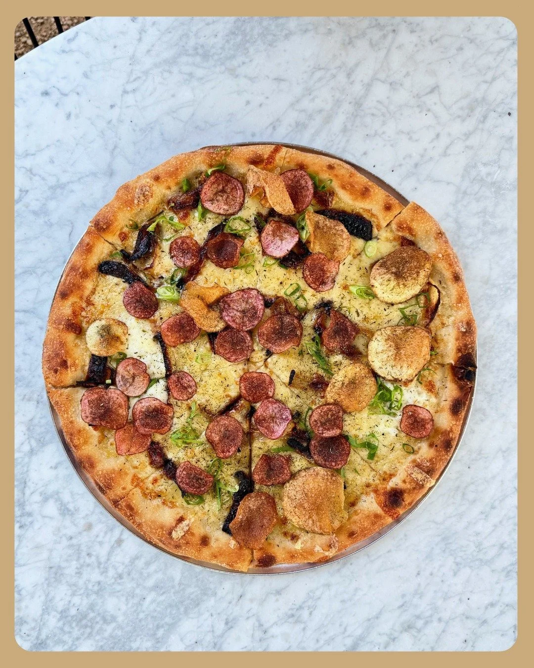 We've had a couple versions of a potato pizza on the menu over the years (who doesn't love starch on starch with cheese!) and we must say v3 might be the best. 

We start with our long fermented sourdough crust, and then add a yukon gold potato puree