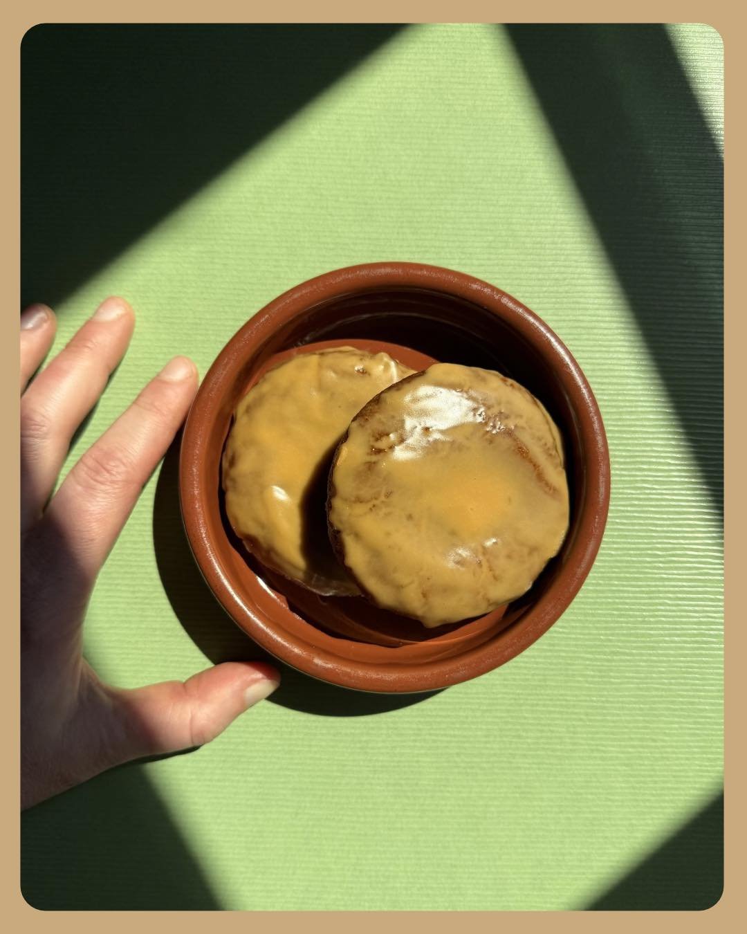 Two warm brown butter amaro cookies are a great way to cap off your meal at Tiny Champs. Feel the powers of brown butter, molasses, and averna amaro combining in your mouth, all with a chewy center, slightly crunchy edges, and averna glazed top. 

Pl