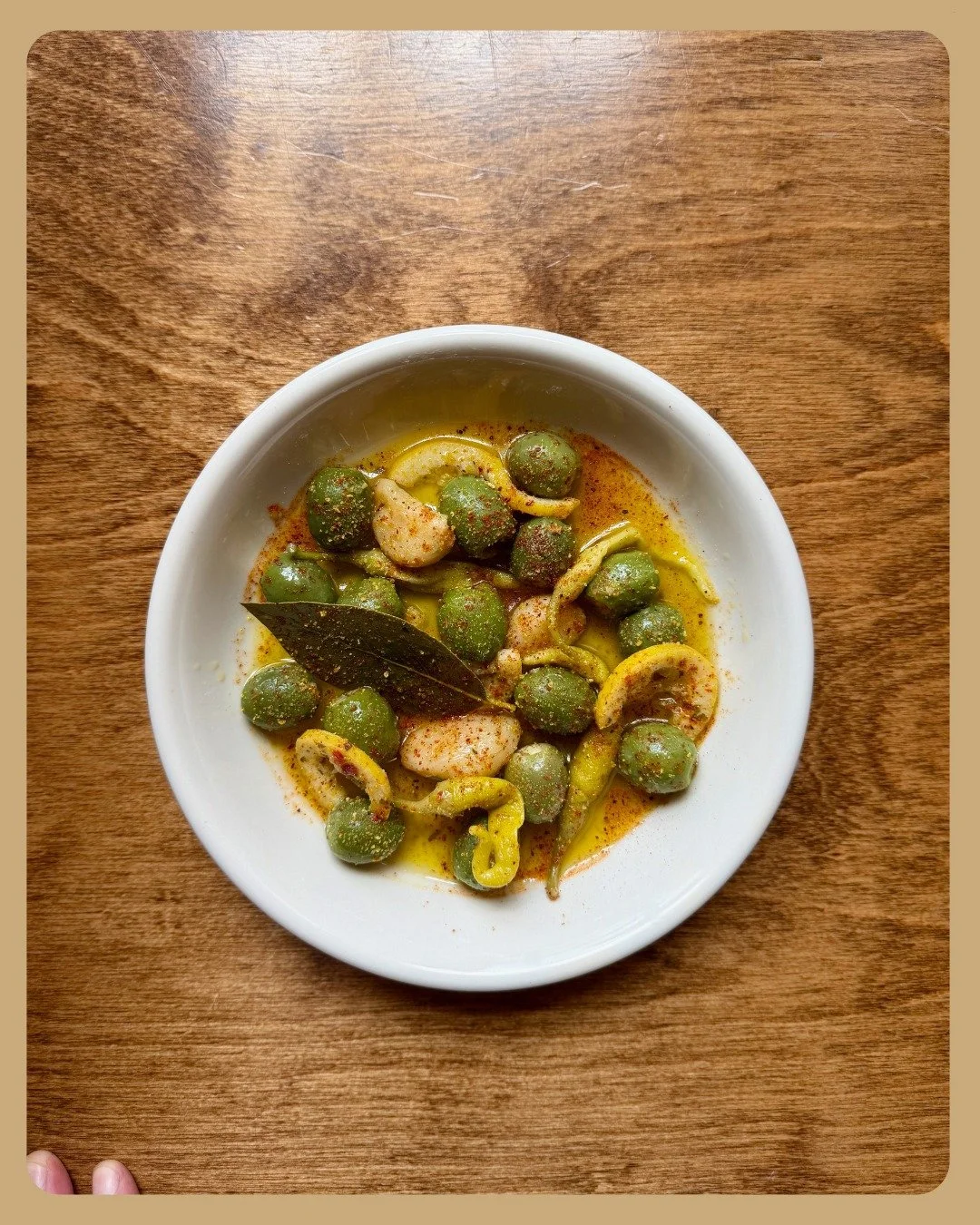 Castelvetrano olives stuffed with blue cheese and ricotta and marinated in lotsa extra virgin olive oil with pickled peppers, confit lemon and garlic. 

Great to open your meal with, and share with some friends (we suggest eating it alongside the pro