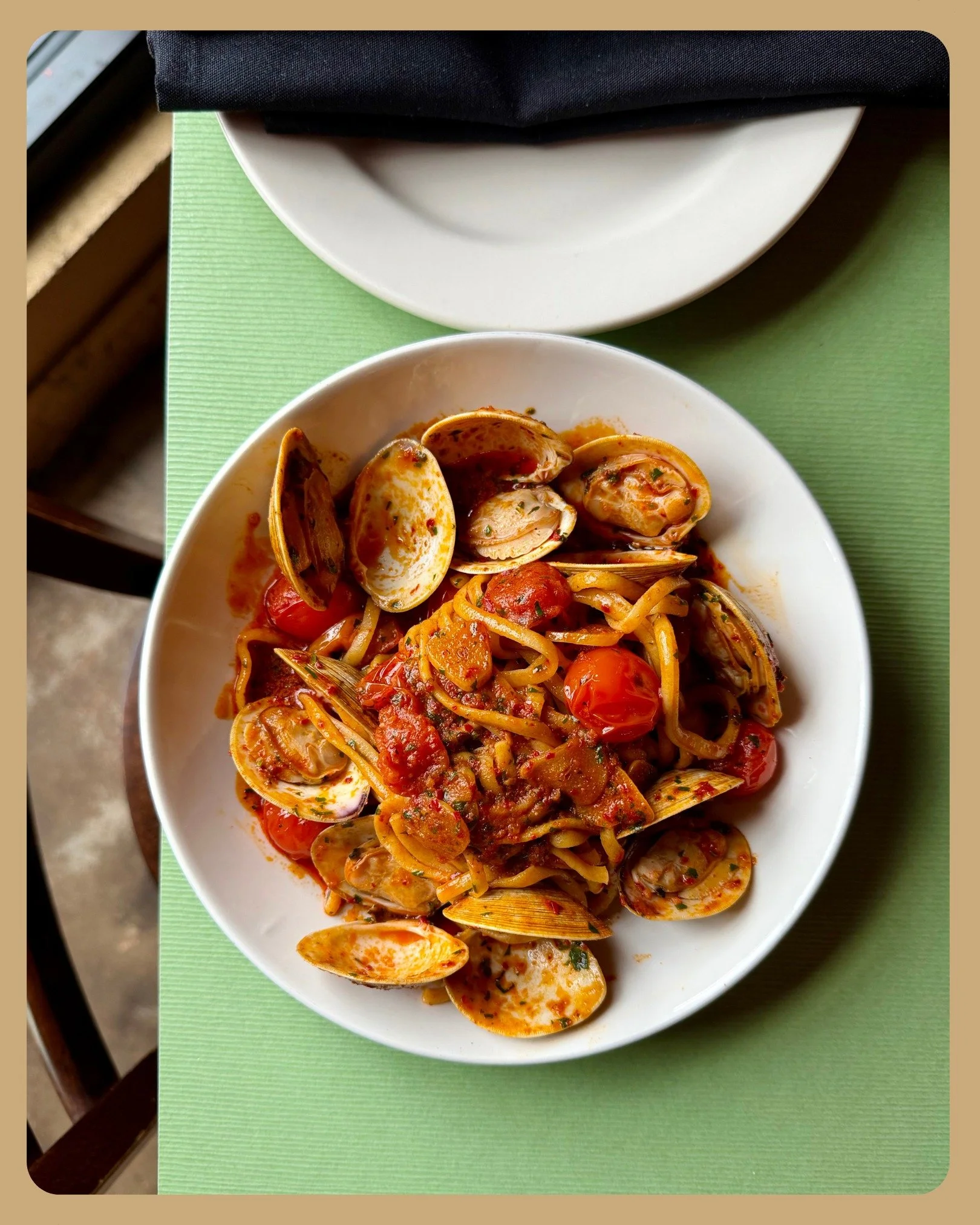 Linguini with spicy nduja and littleneck clams in a burst tomato sauce. Briny, a lil spicy, light and summery, and great with a glass of wine (just ask your server, who might be @gunner_blaze !)