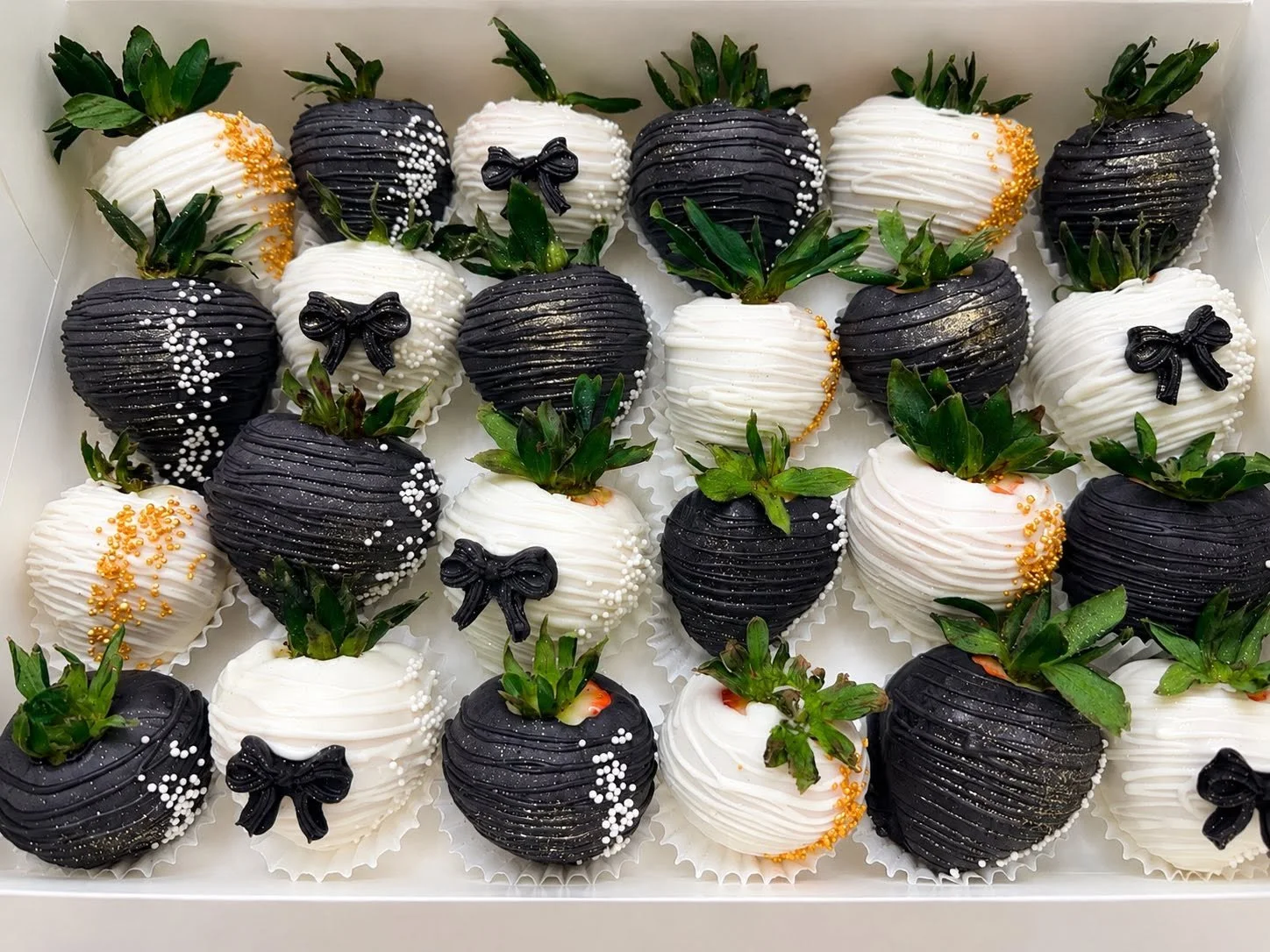 Black, white, and gold elegant graduation chocolate covered strawberries