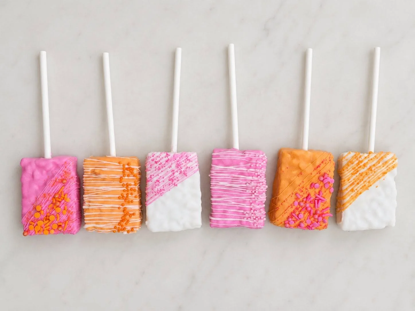 Bright Pink and Orange Dipped Crispy Treats