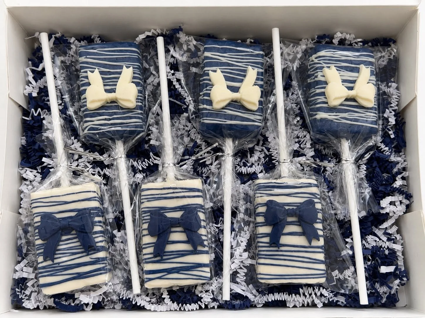 Blue and Ivory Dipped Crispy Treats with bows