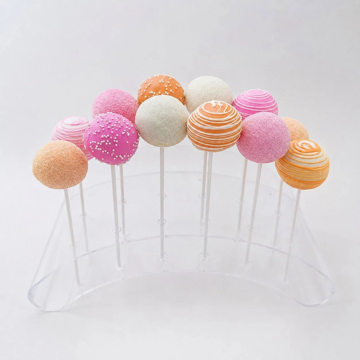 Bright Pink and Orange Cake Pops in Stand