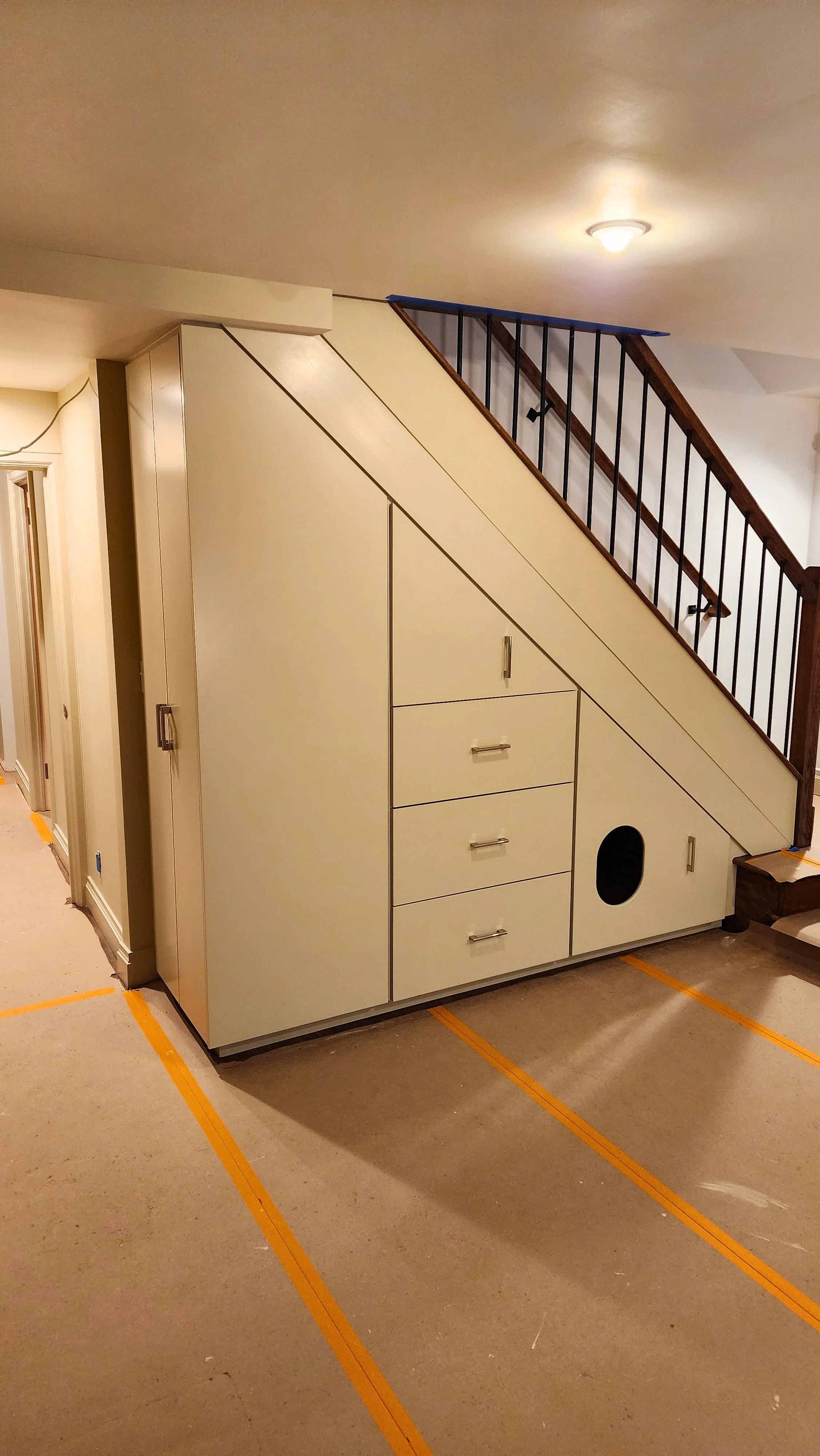 under-stairs-storage-unit-built-by-devine-woodworking.jpg