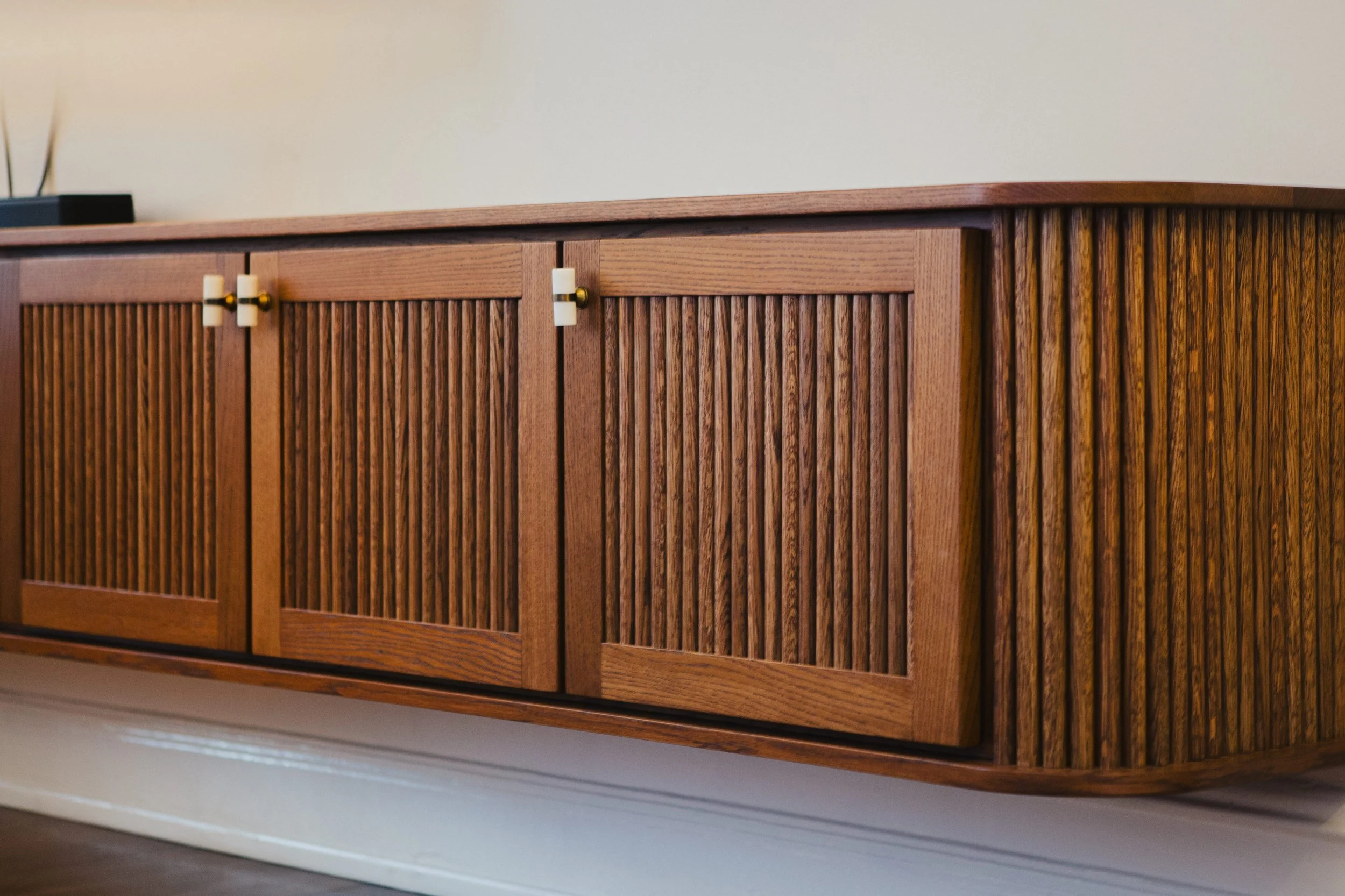 white-oak-art-deco-floating-media-storage-unit.jpg