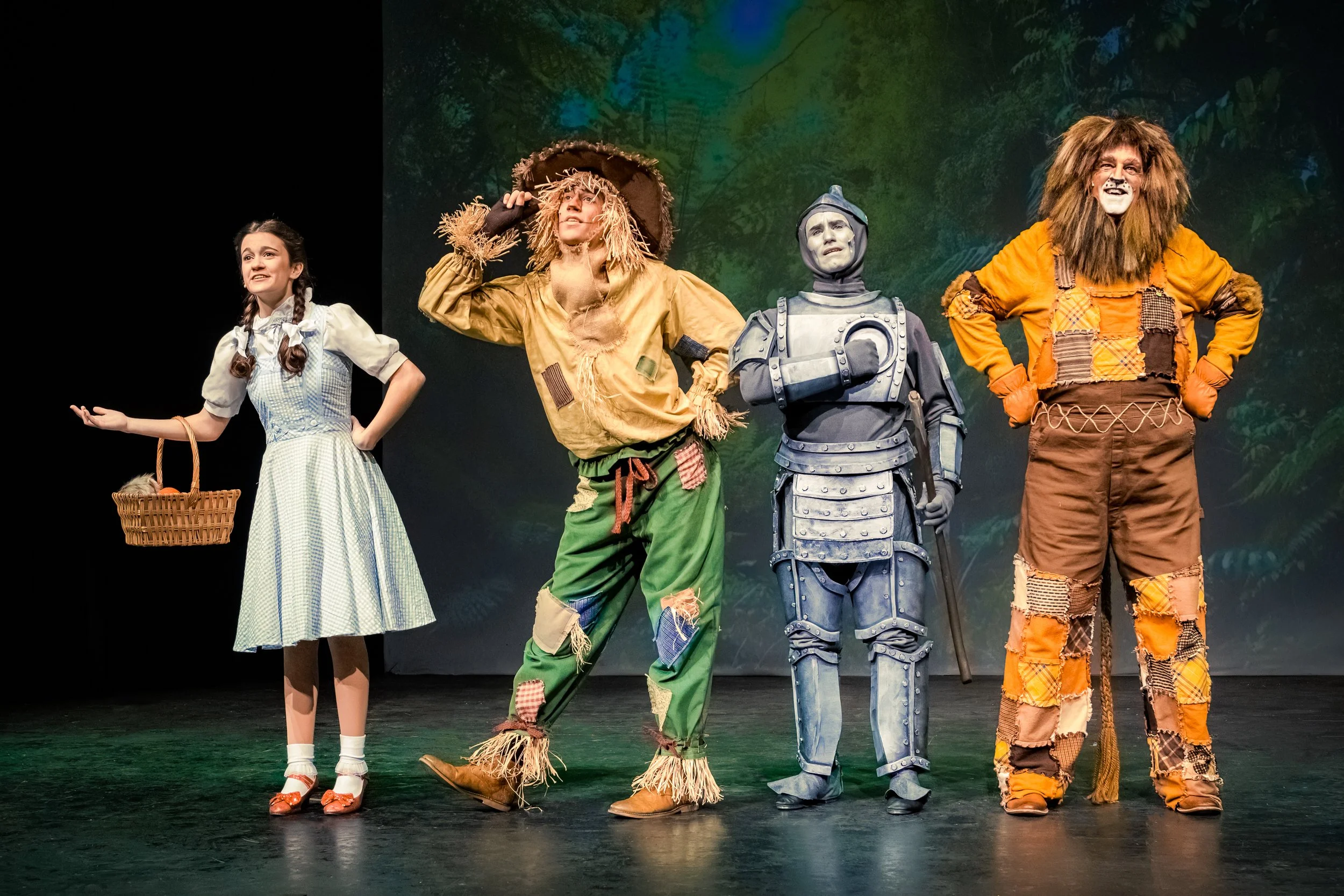 - Dorothy, Scarecrow, Tin Man, and Cowardly Lion in The Wizard of Oz.