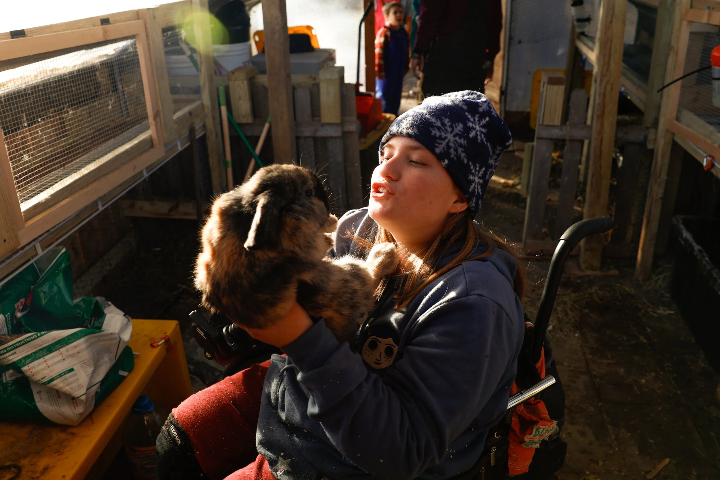 Reagan Burman, 19, holds one of her rabbits, Lola, on Tuesday, Nov. 4, 2025, at the Burman homestead in Austin.