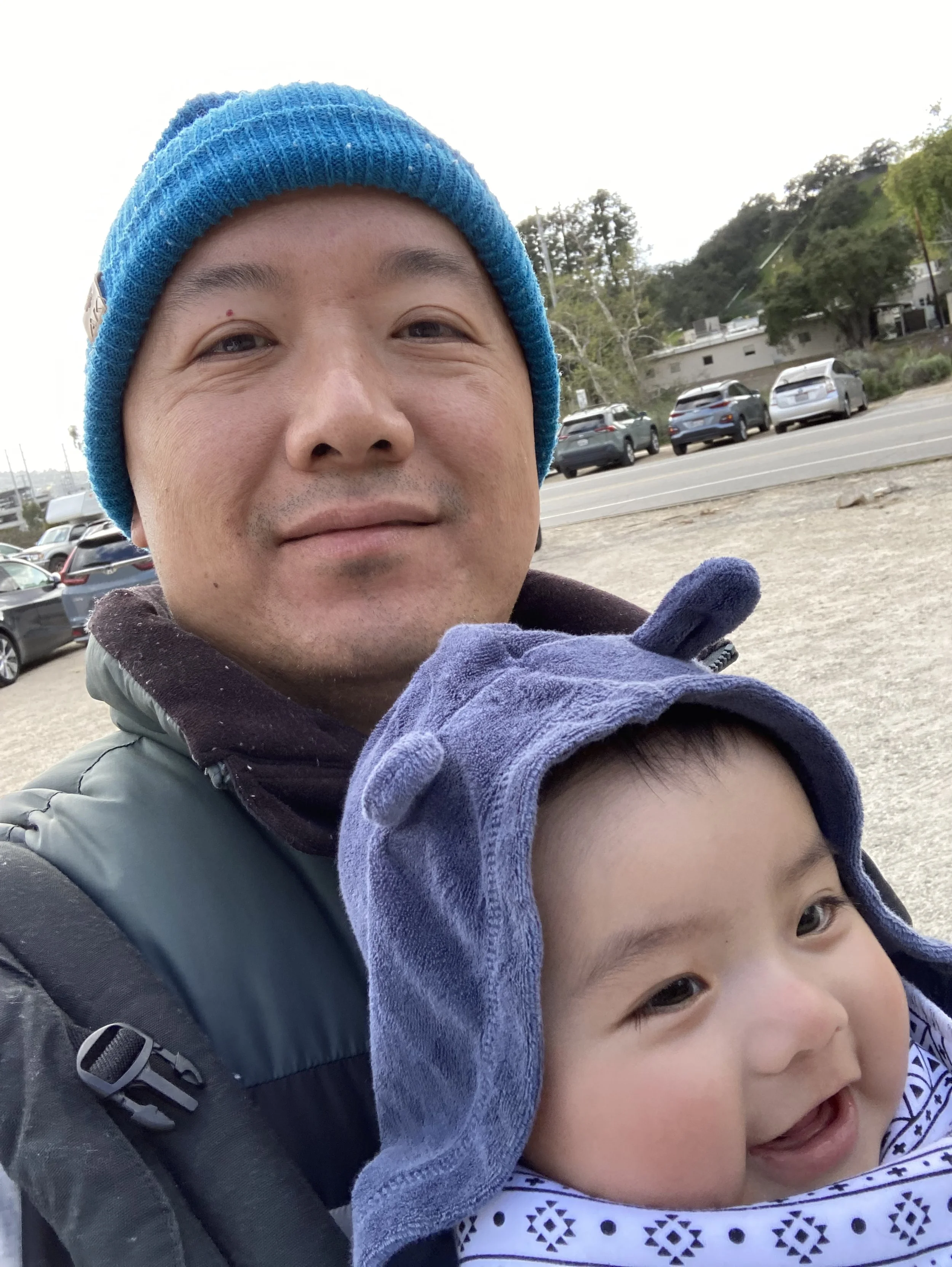 Kenji Liu with his son