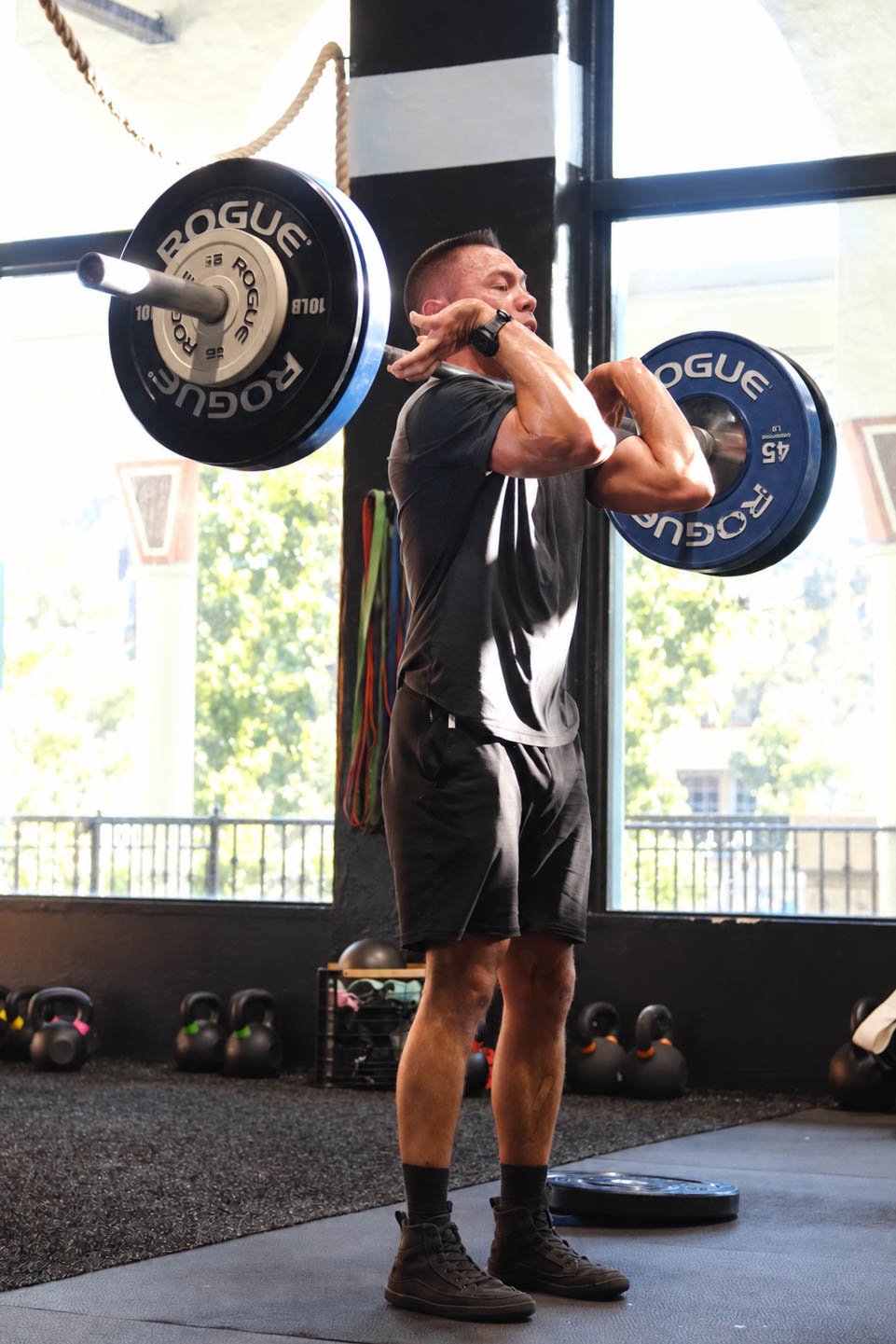 Barbell Front Rack in Sunlit Gym.jpg