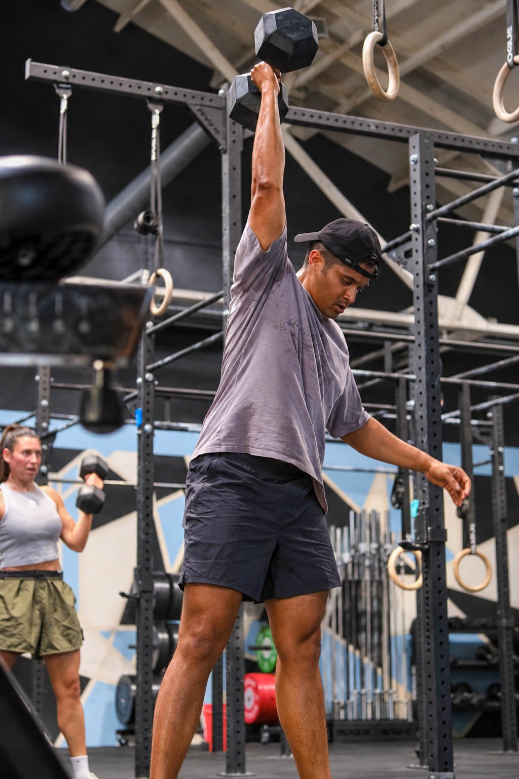 Focused Dumbbell Press in the Gym (1).jpg