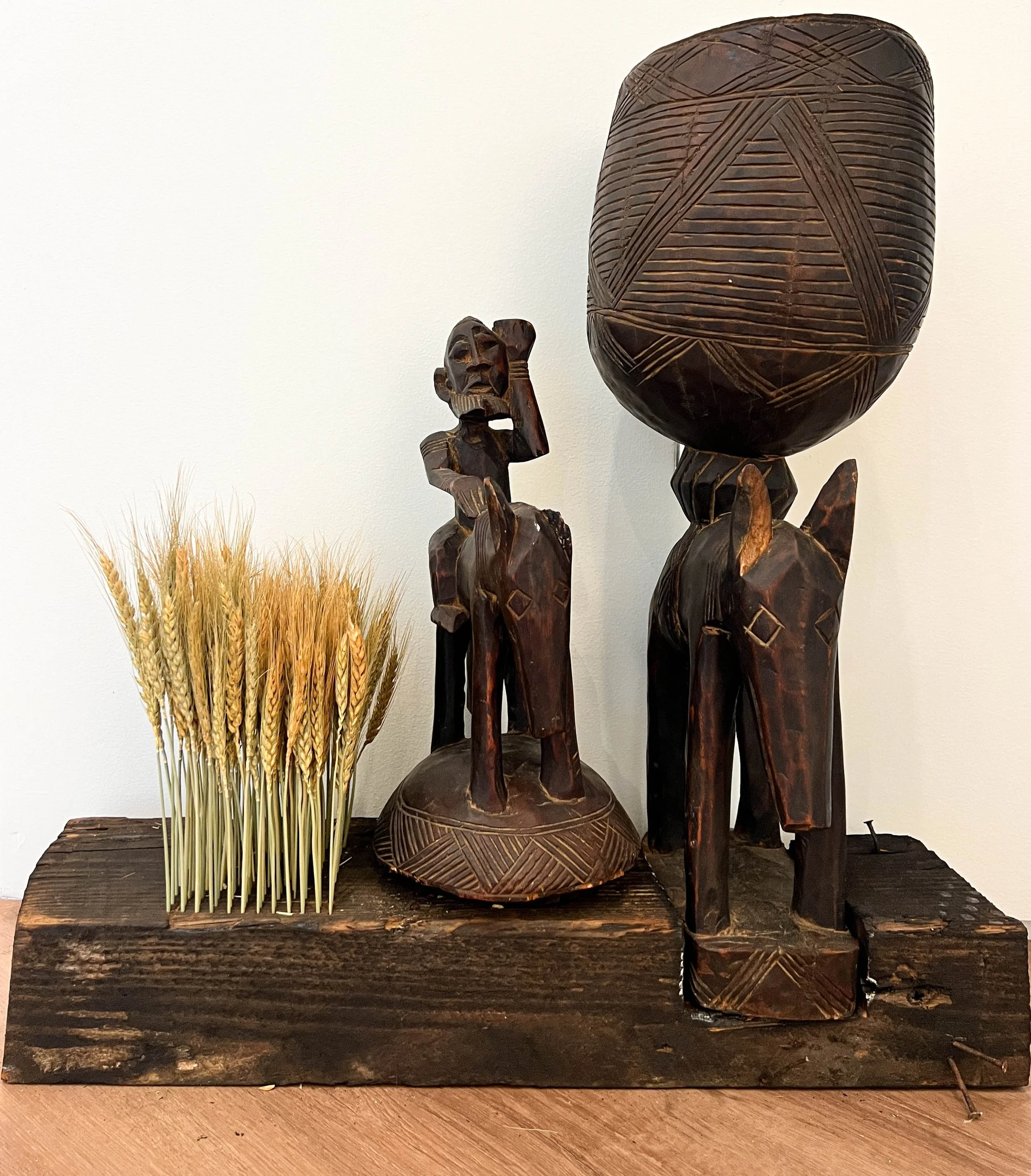 Triumph Over Scorched Earth, 2025 --
53" x 9" x 10" --
African Sculpture, Reclaimed Heart Pine, Dried Wheat Stock --
Inquire for Pricing