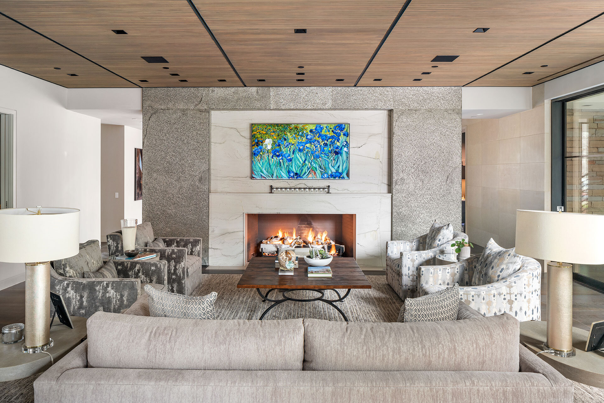  Large fireplace anchor massive stone walls within open plan in this modern contemporary home designed by Bernbaum/Magadini Architects 