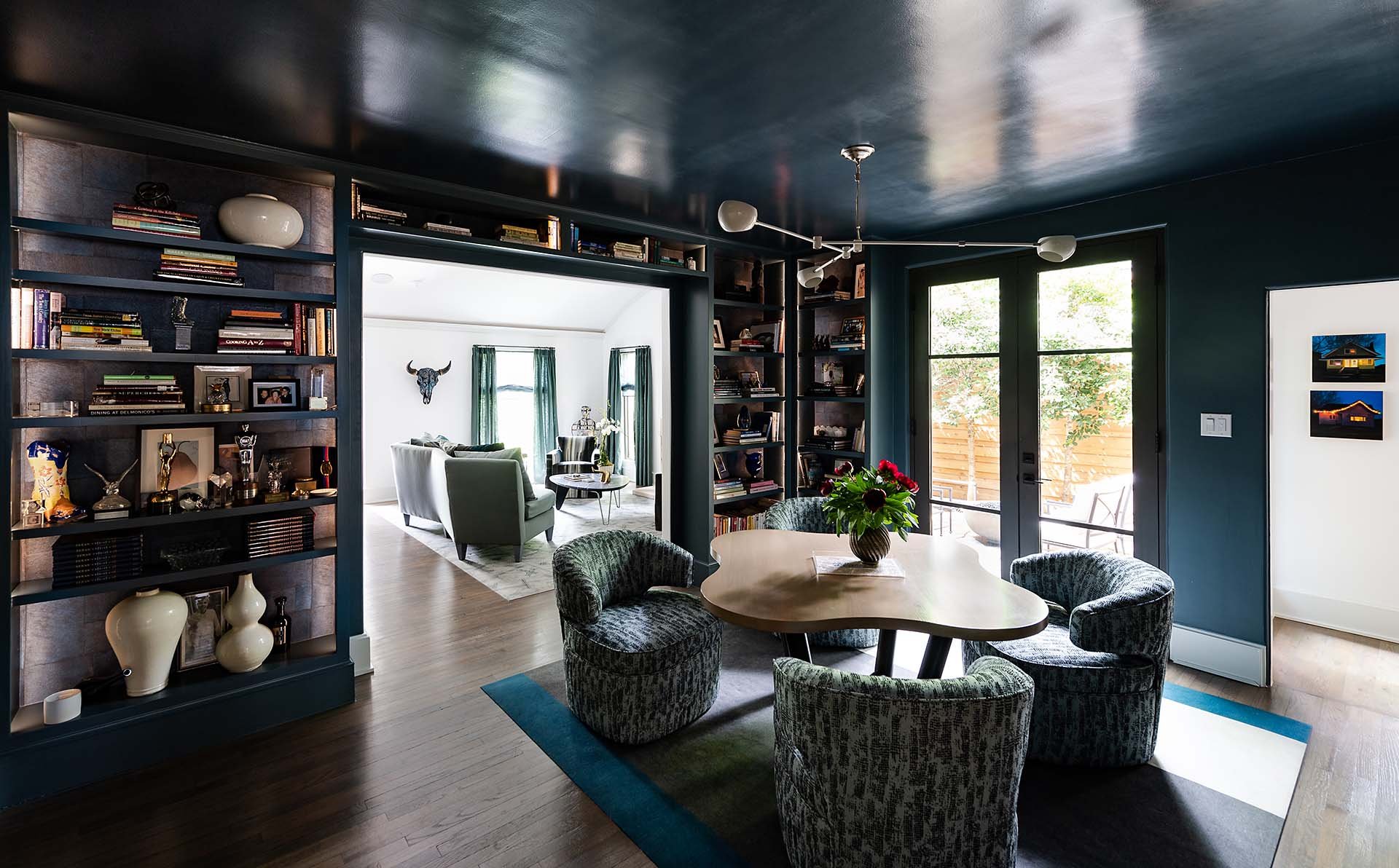  A Bernbaum/Magadini Architects modern contemporary elegant and cozy library with lacquered blue walls and ceiling. 