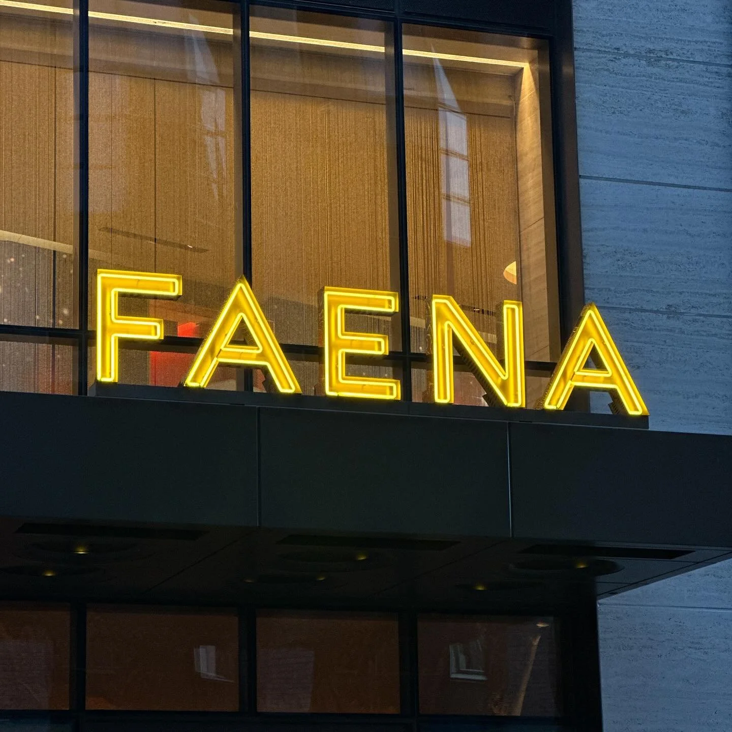 &ldquo;FAENA&rdquo; - Gold channel letters w/ Sunflower neon tubing