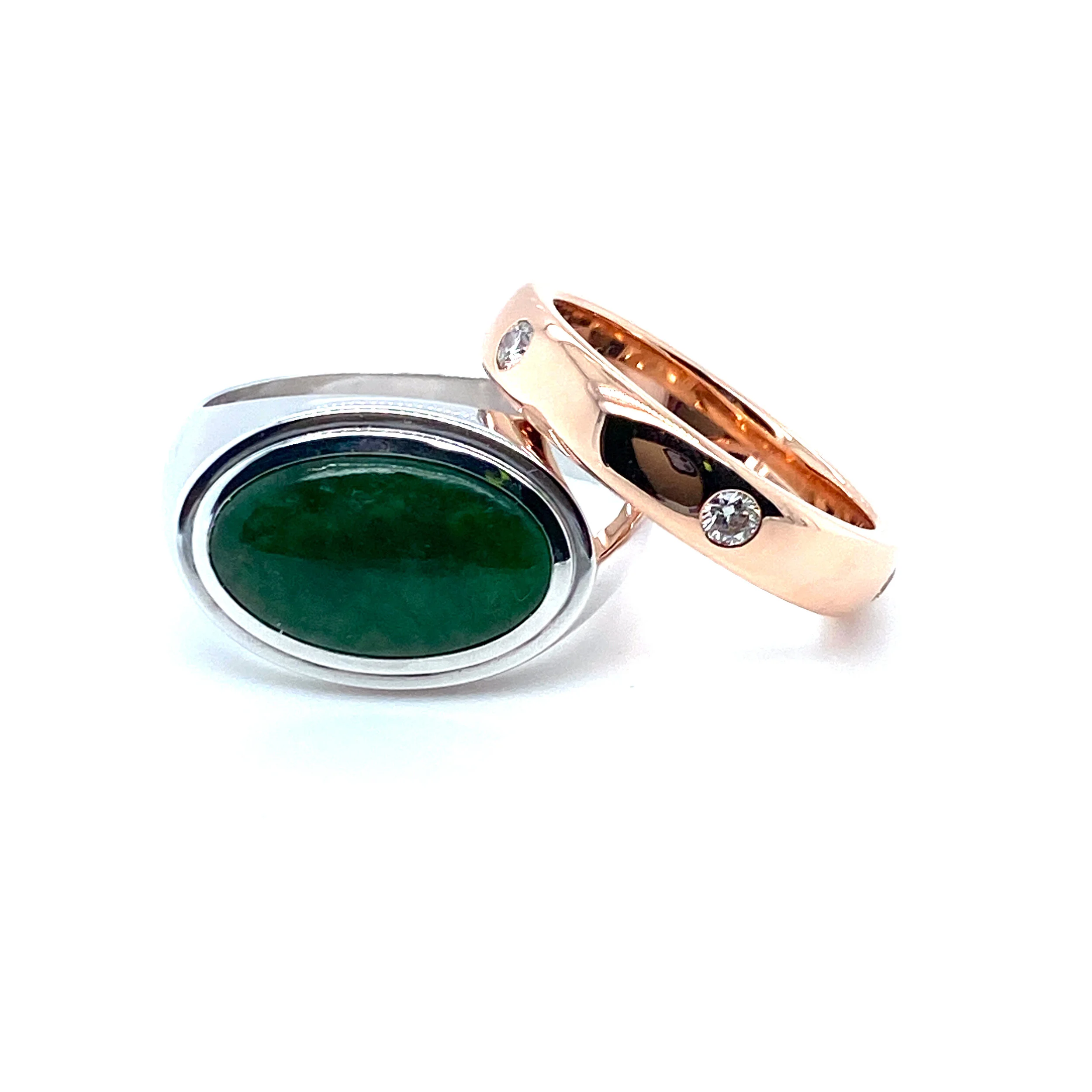 His & hers wedding rings. An 18ct rose gold and diamond band for her while he chose a white gold signet ring with jade. 