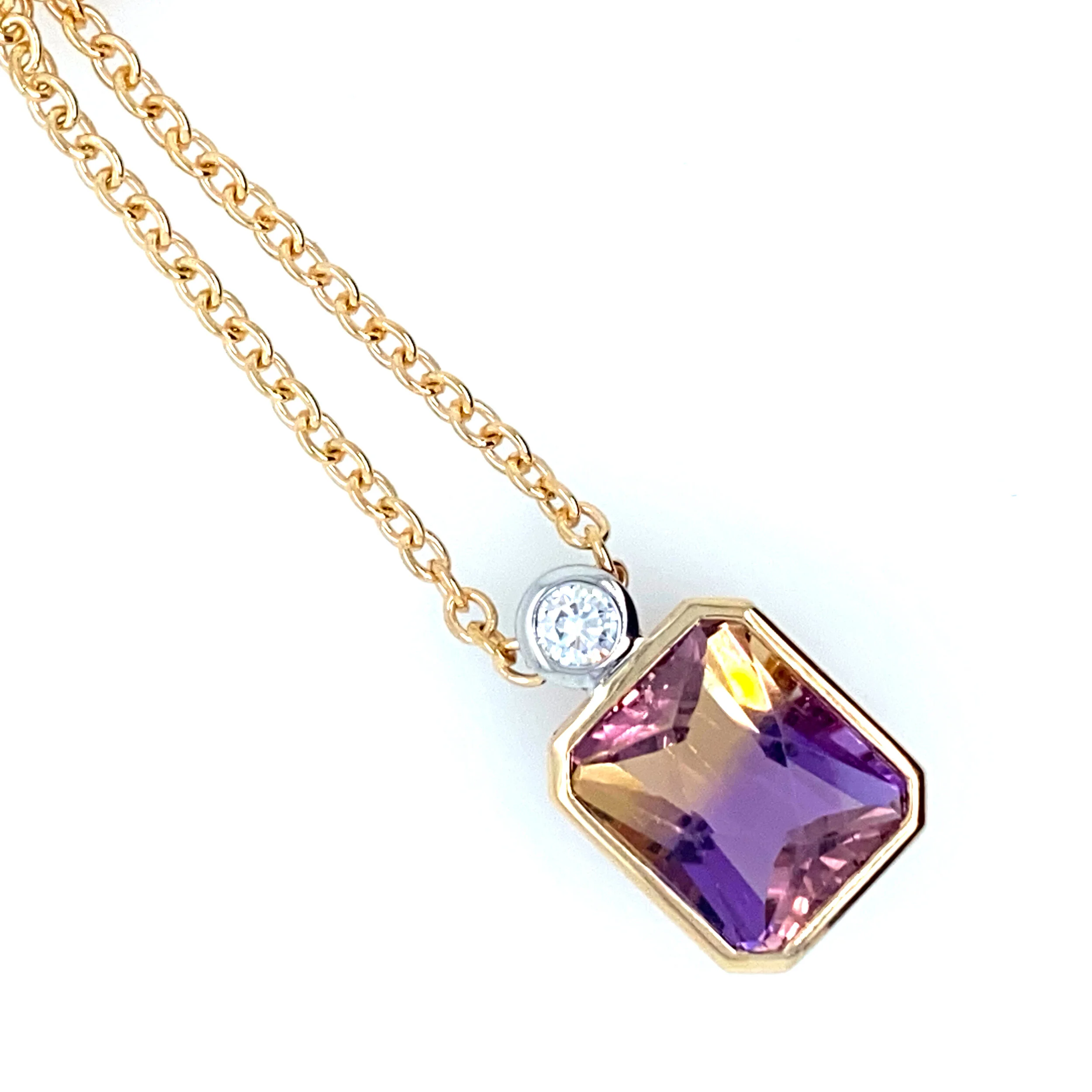 A gorgeous ametrine and diamond pendant set in 18ct yellow & white gold.  This beautiful gem was selected from some of our current stock at the Kiama store. 