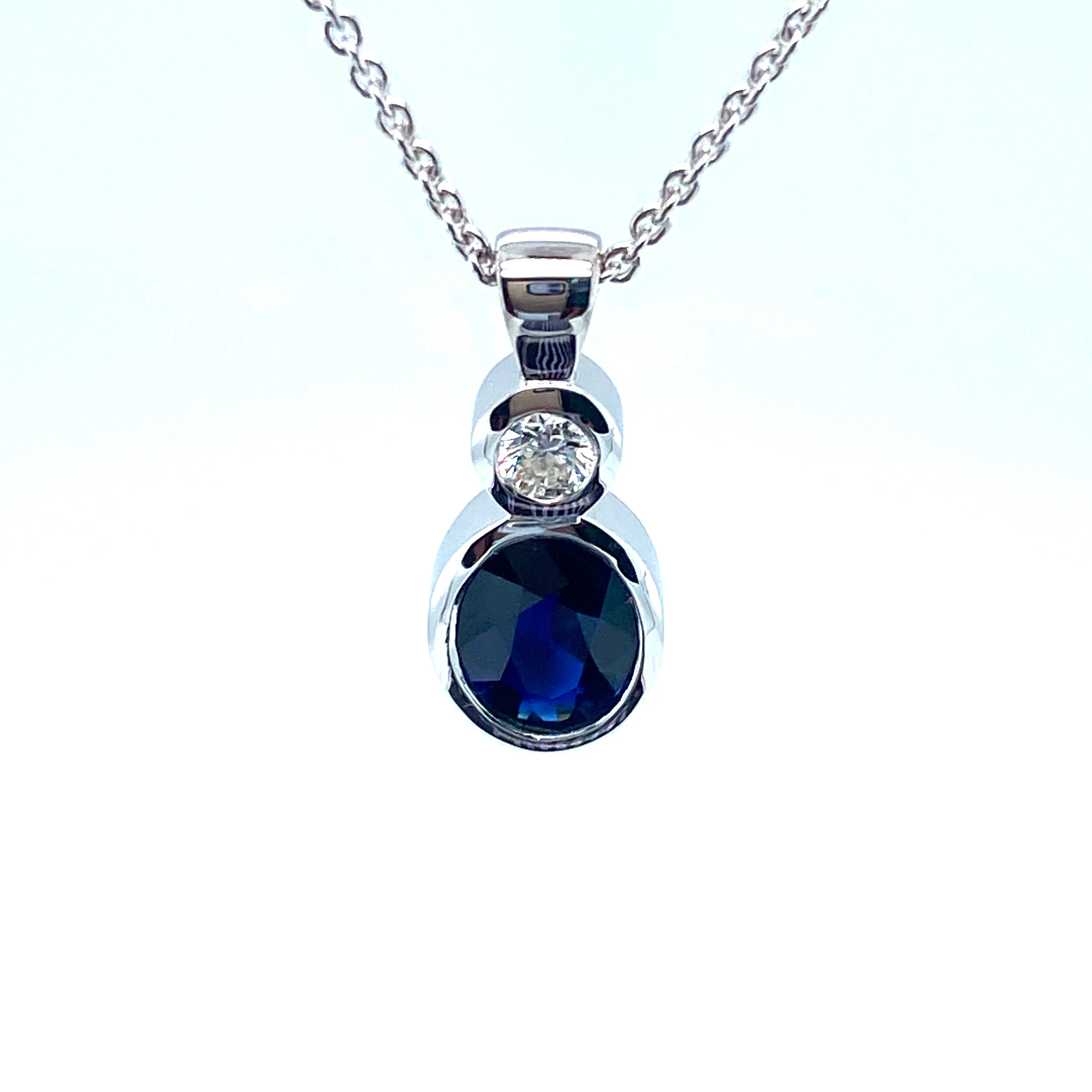 A gift from mother to daughter.  A 1.57ct Australian sapphire with 0.10ct diamond set in white gold. 