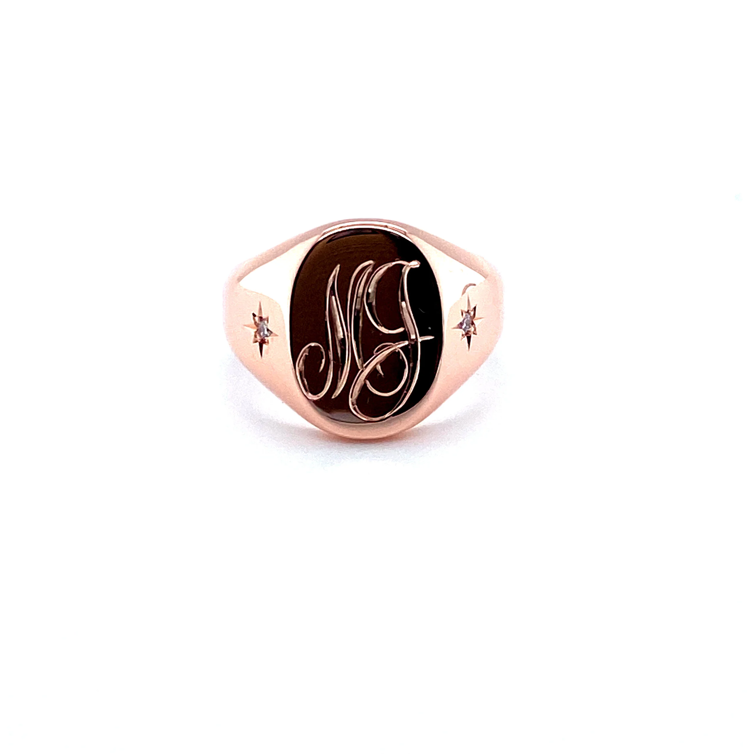Rose gold signet ring with two 0.04ct star set diamonds.  Mother and daughter's initials were both hand engraved.