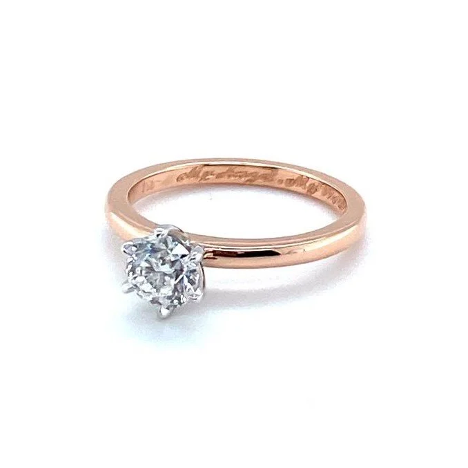 0.90ct brilliant cut solitaire engagement ring with hand engraving inside an 18ct rose gold shank. 