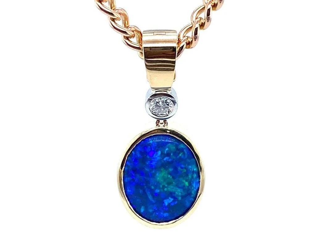 An opal and diamond pendant recently designed for a client.
