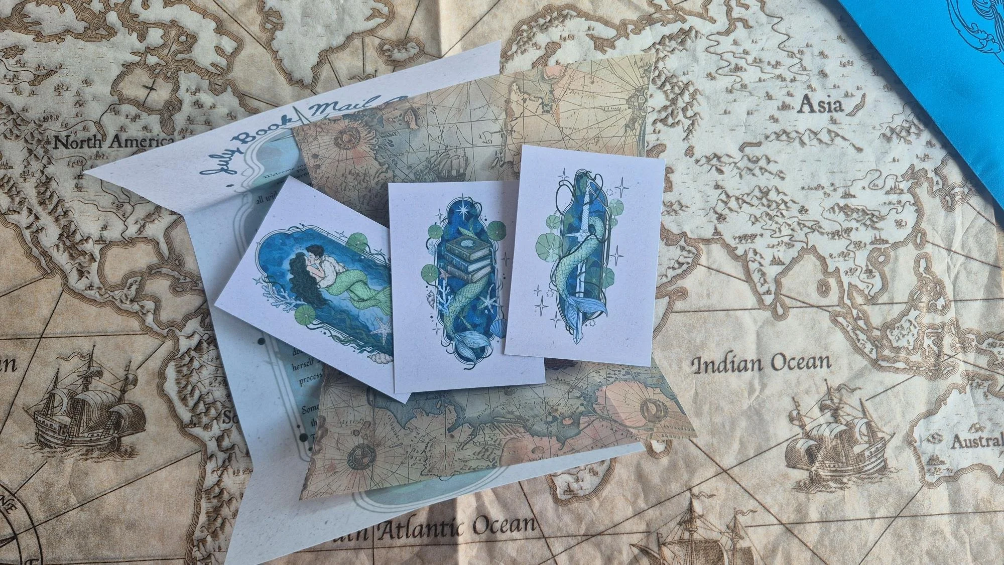 July Book Mail Club – Pirates & Sirens Theme | Monthly Book Subscription Box | Bookish Gift for Readers | Fantasy Book Club | Exclusive Art & Stationery