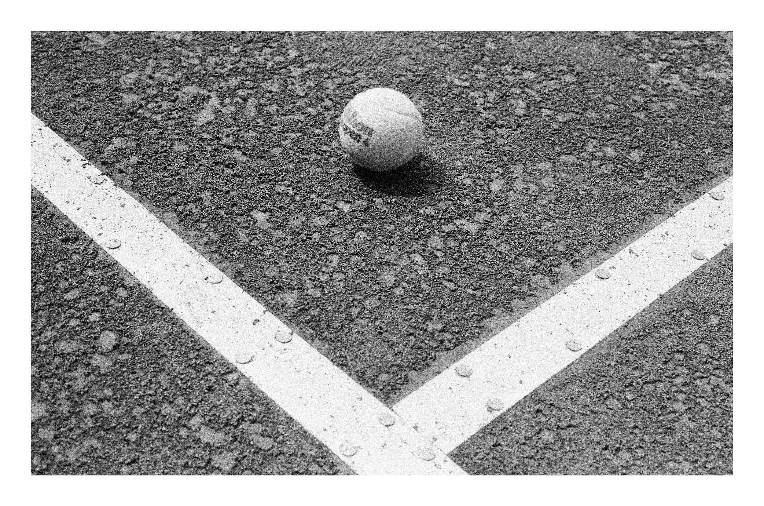 Who brings a film camera to a tennis court? Apparently I do. Carly has infinite patience for my antics.