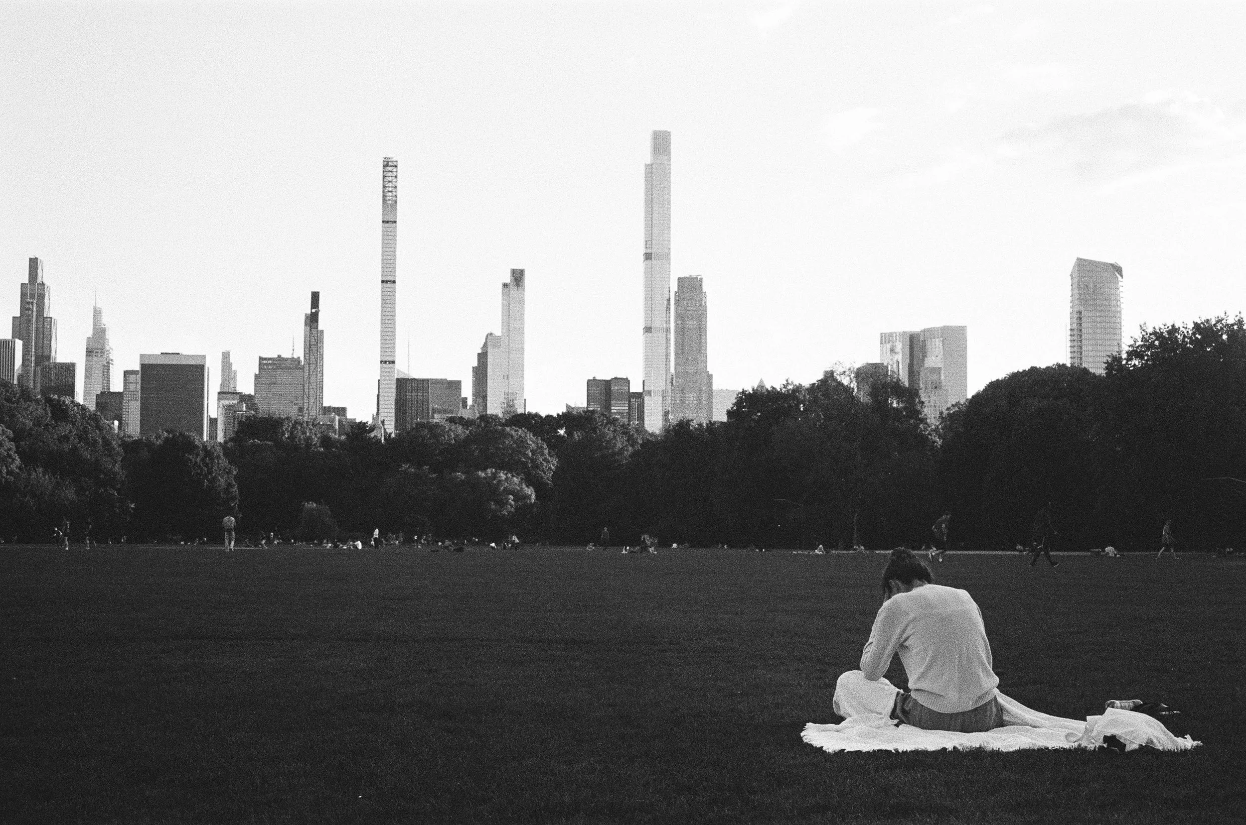 I personally despise the supertall skyscrapers on 57th Street, but I have to admit they make for a great backdrop for reading a book in Central Park.