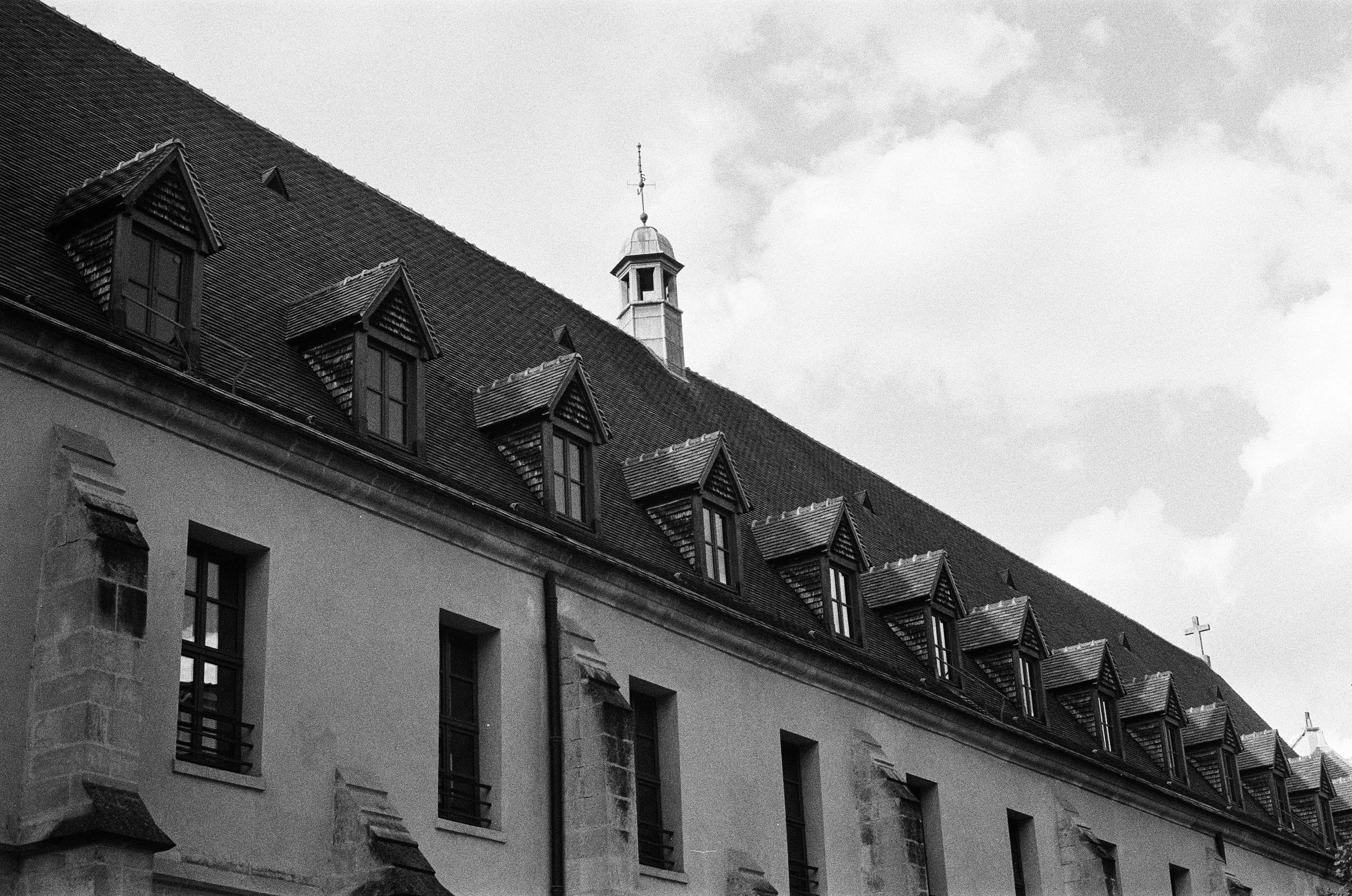 I found this building right outside my hotel in the Latin Quarter of Paris. The rooftop felt very classically European and deserved a photo.