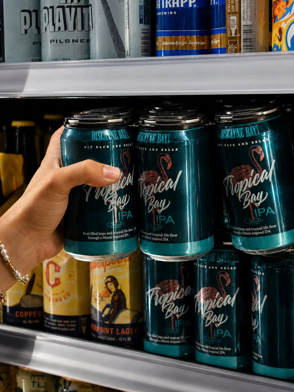 Good taste is always within reach. 😎 Grab a pack of Tropical Bay IPA at your nearest grocery store and bring a little Miami to your next adventure. 🌴🍻⁠
⁠
#BiscayneBayBrewing #TropicalBayIPA #DrinkLocal #MiamiBeer #StockTheFridge