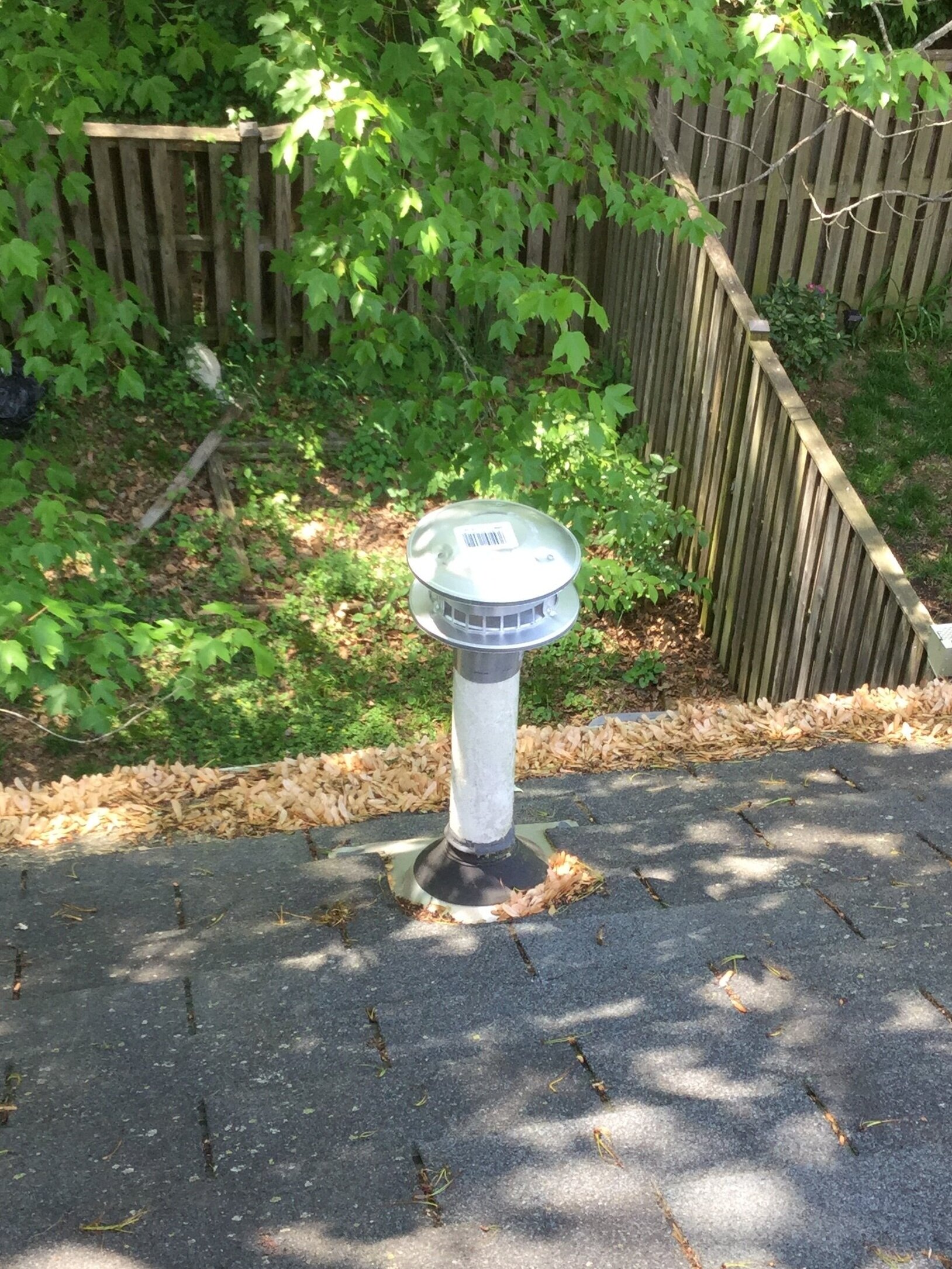 Bathroom exhaust pipe after pipe cover installation.