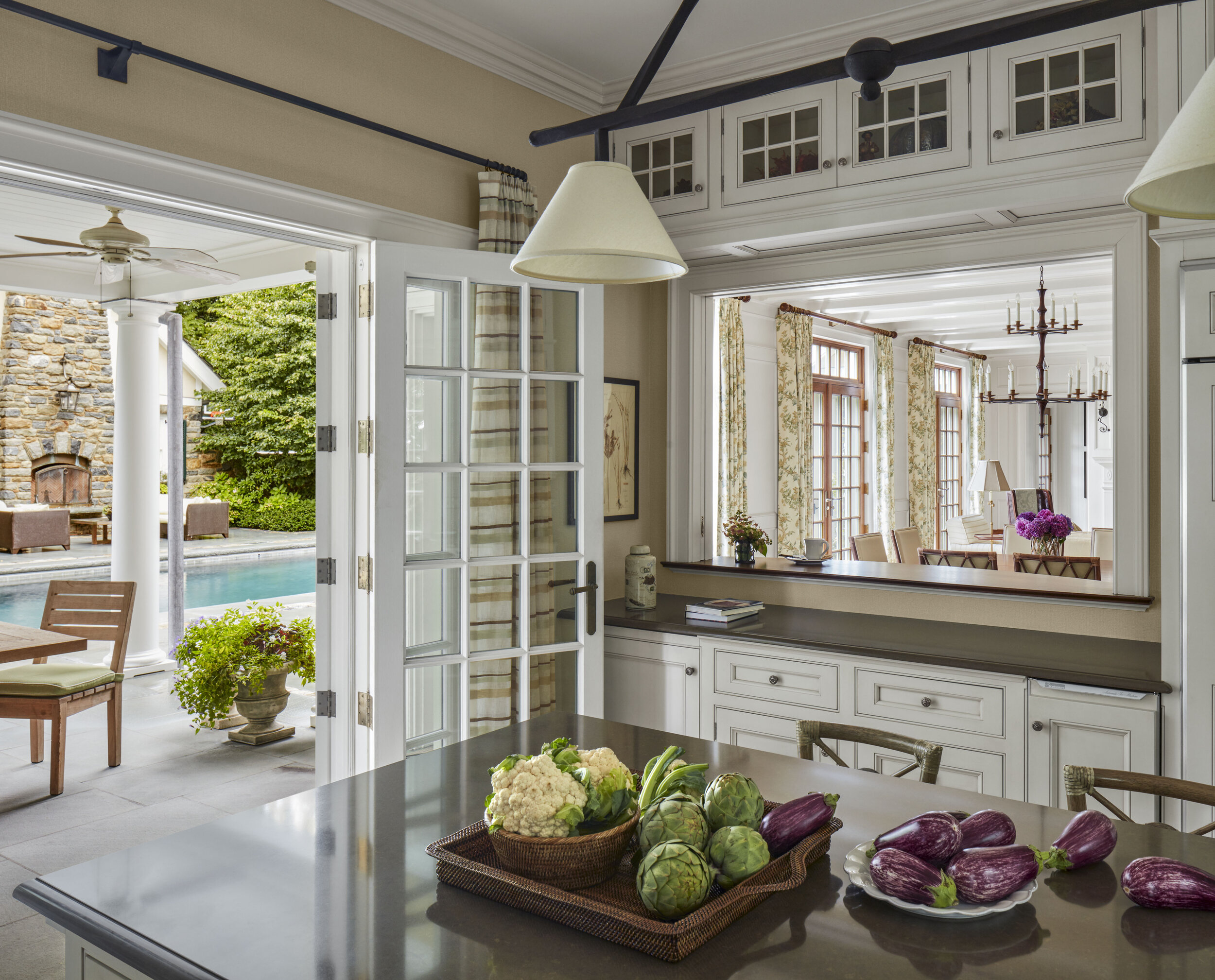 Colonial home in Greenwich CT, kitchen with wood range hood