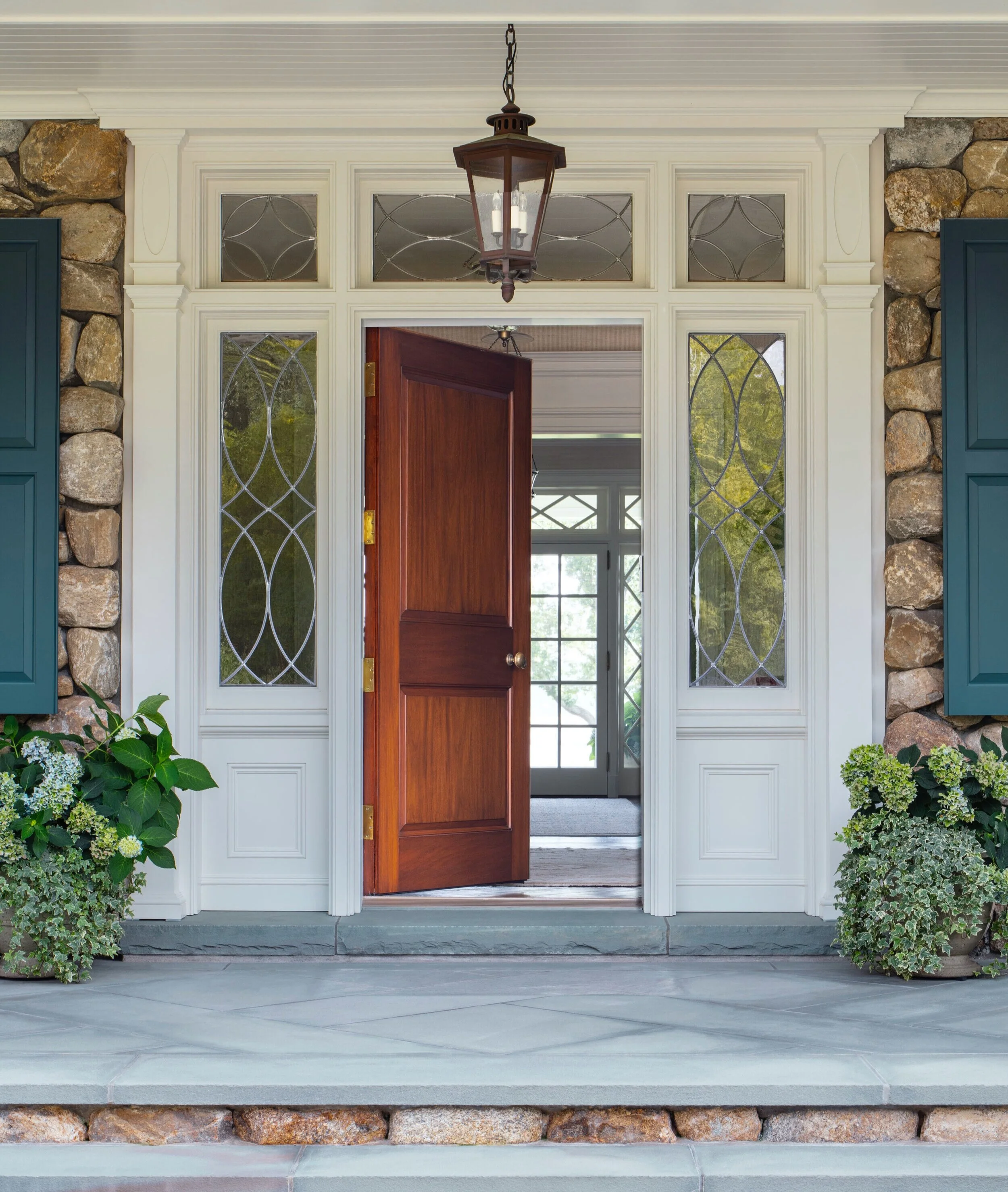 Georgian home in Greenwich CT, entry foyer with grand staircase