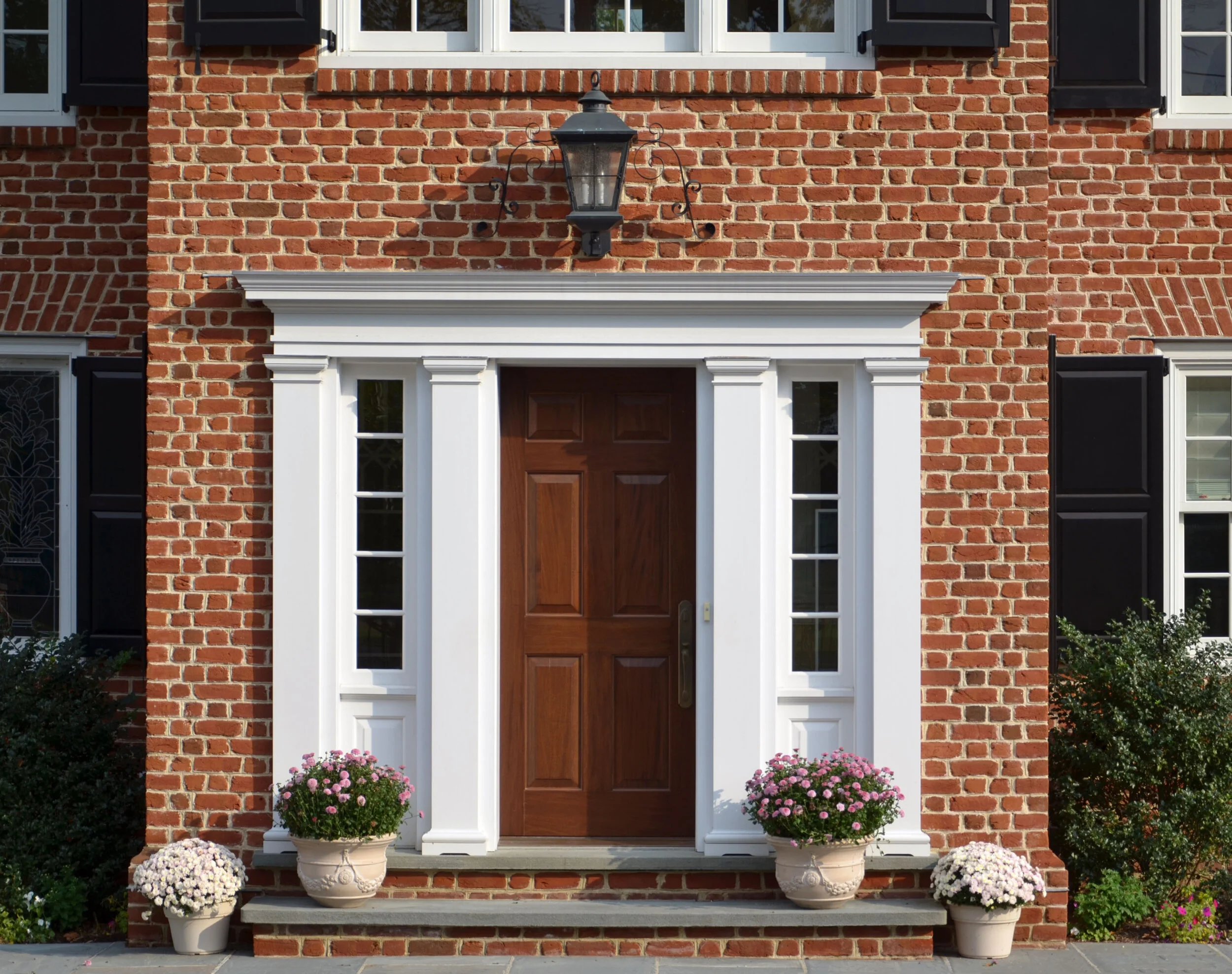 Tudor home in Greenwich CT, arched entry door