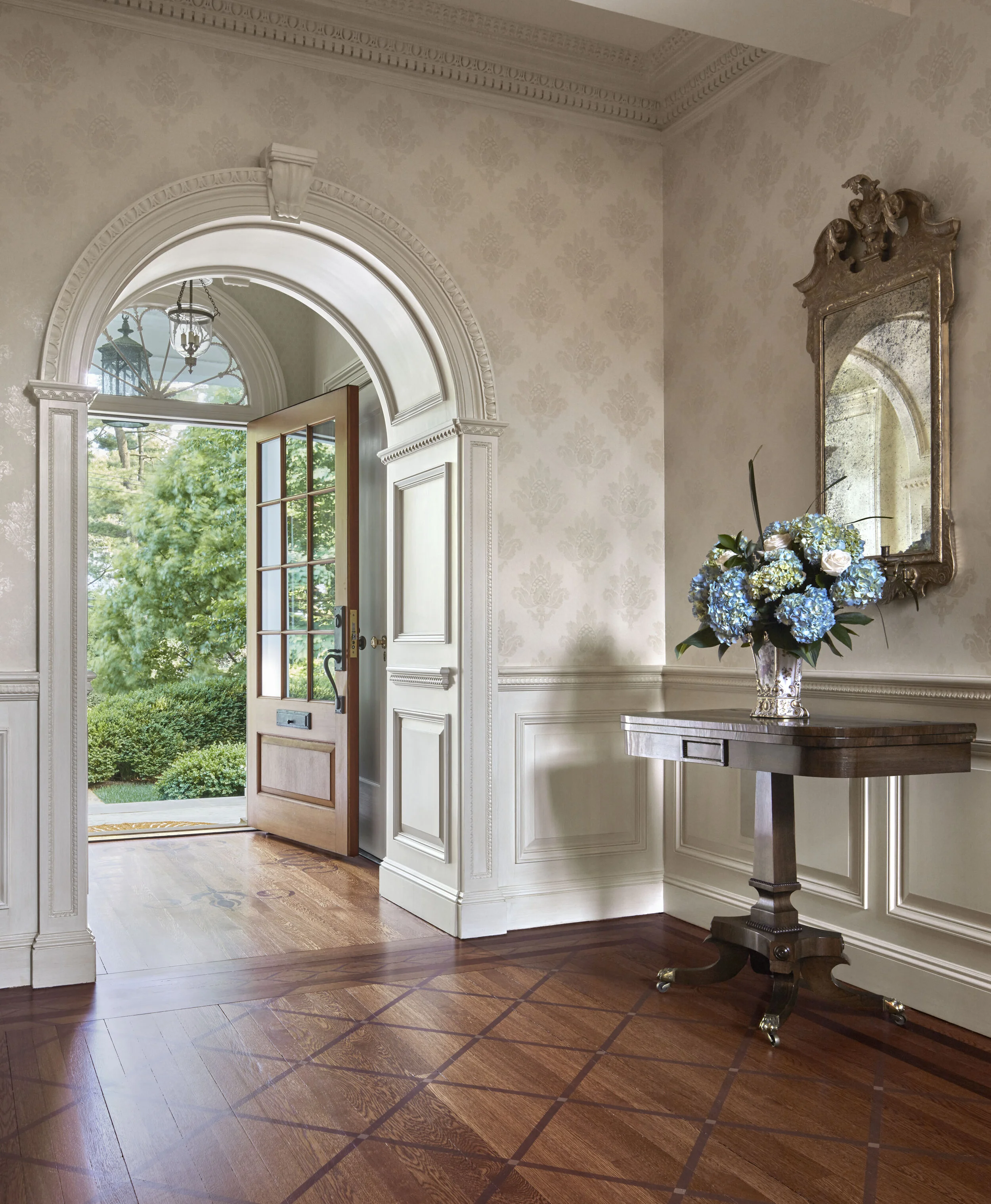 Georgian home in Greenwich CT, entry foyer herringbone floor detail